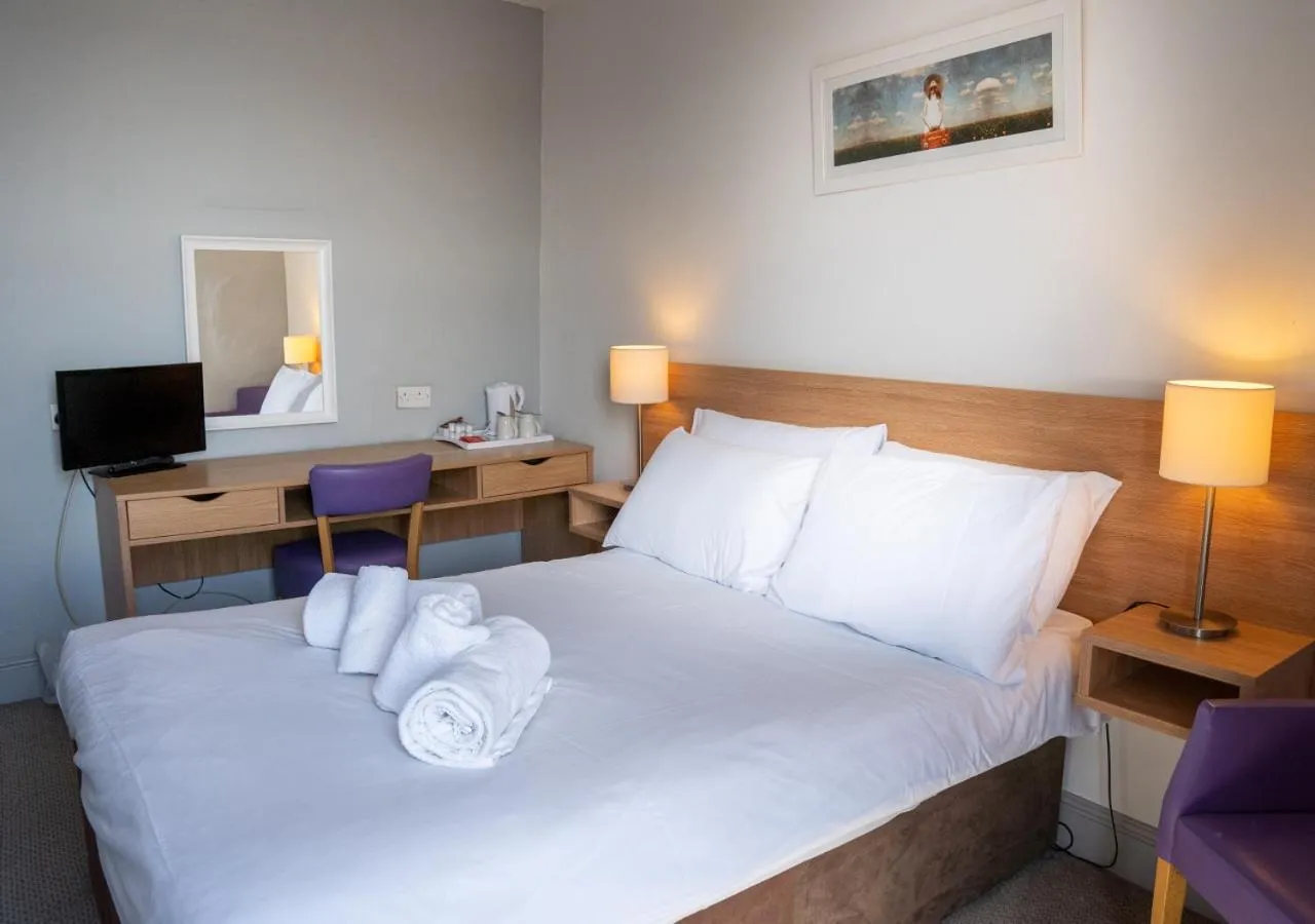 Bed in The Seafront Hotel by Compass Hospitality
