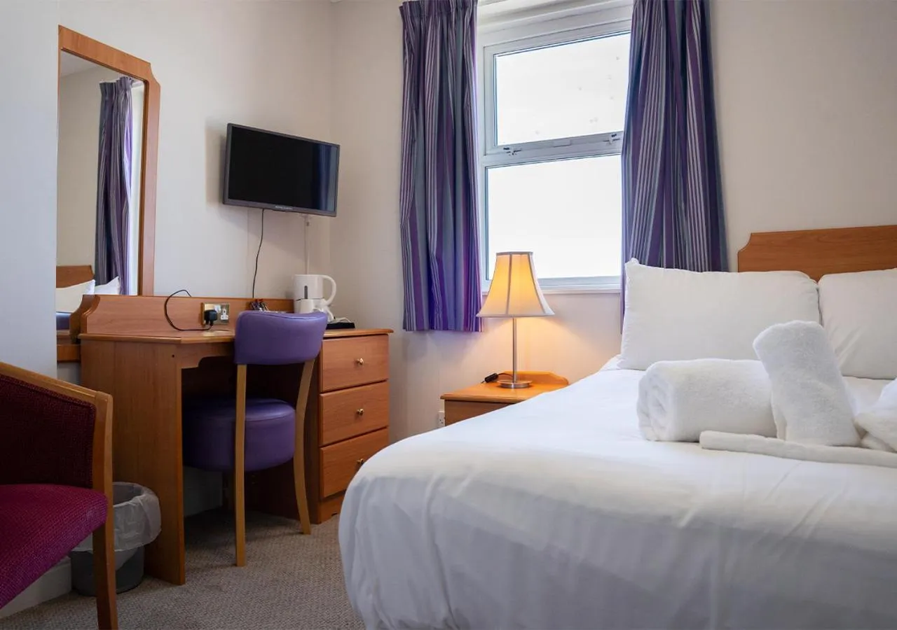 Bed in The Seafront Hotel by Compass Hospitality