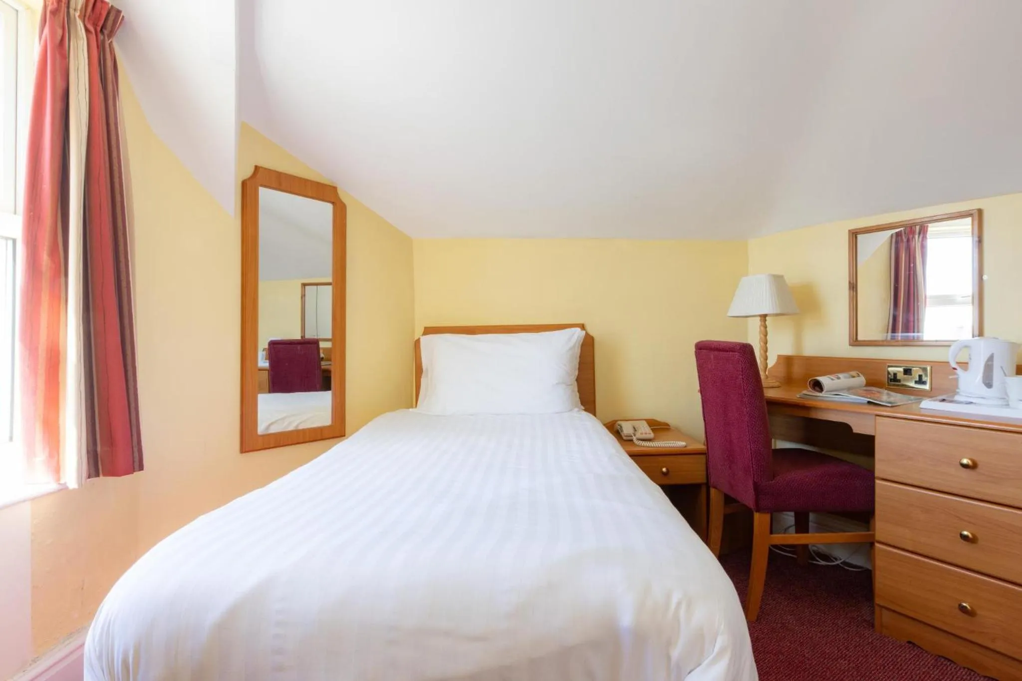 Bed in The Seafront Hotel by Compass Hospitality