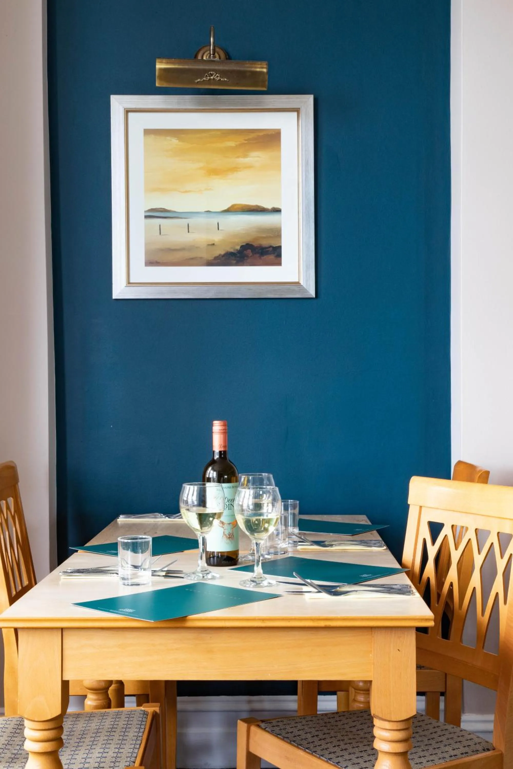 Dining area in The Seafront Hotel by Compass Hospitality