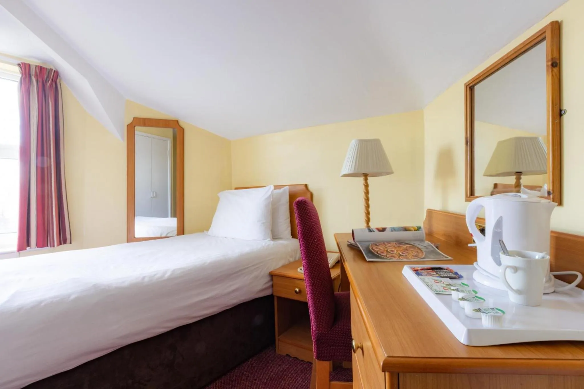 Bed in The Seafront Hotel by Compass Hospitality