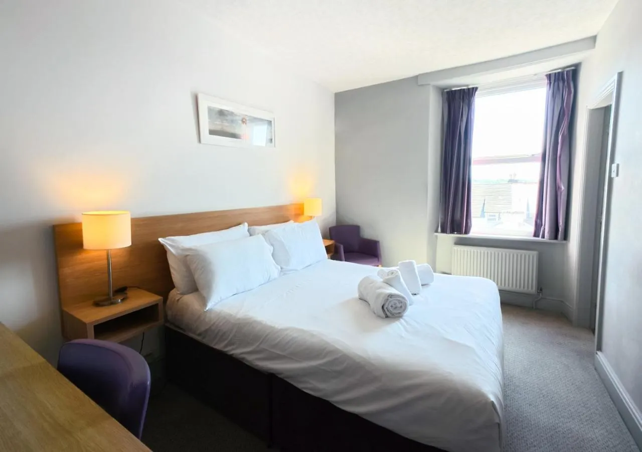 Bed in The Seafront Hotel by Compass Hospitality