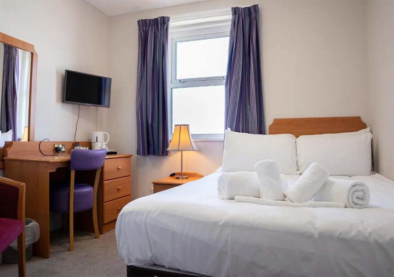 Bed in The Seafront Hotel by Compass Hospitality