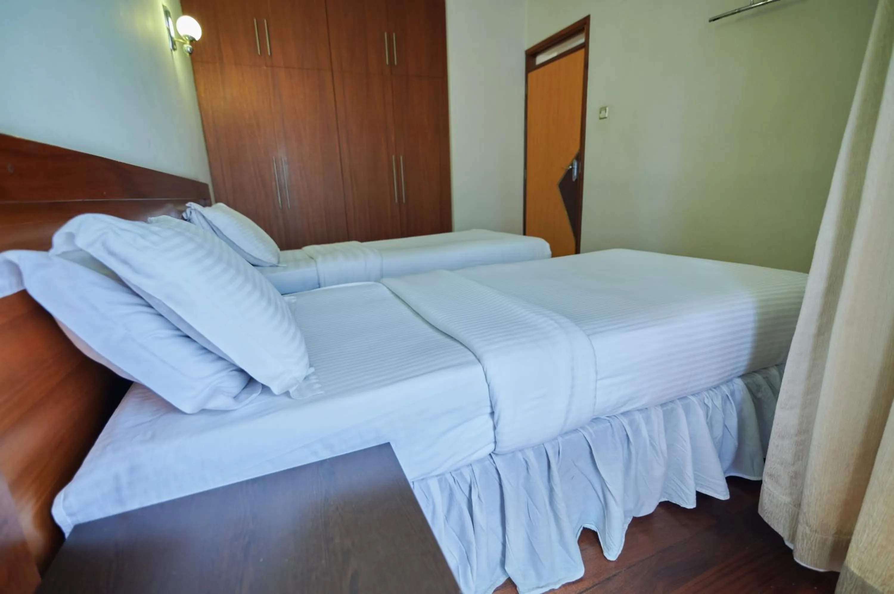 Bedroom, Bed in Batians Apartment Hotel