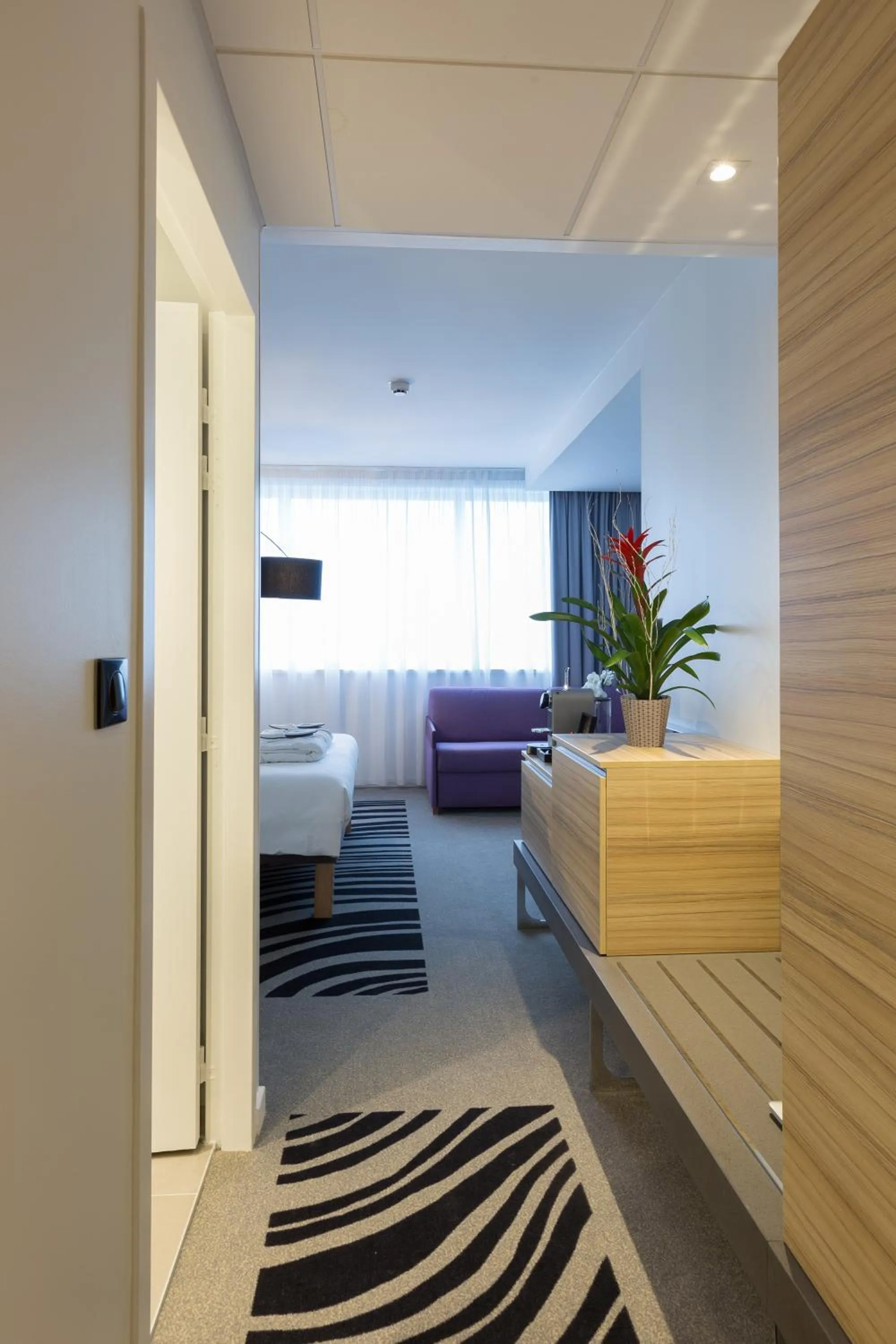 Photo of the whole room, Bed in Novotel Poitiers Site du Futuroscope