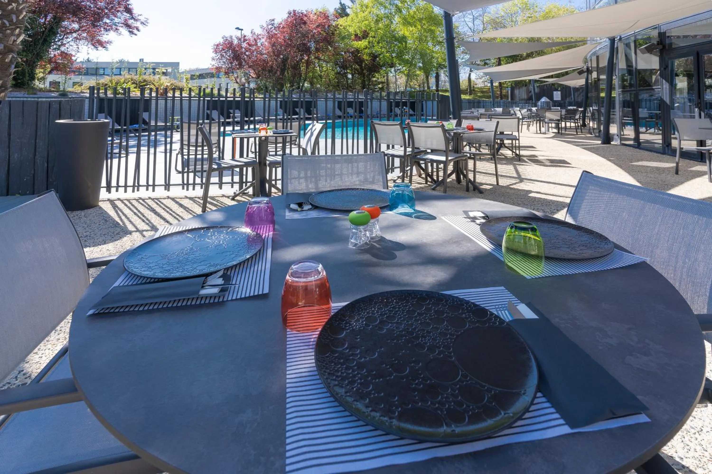Swimming pool in Novotel Poitiers Site du Futuroscope