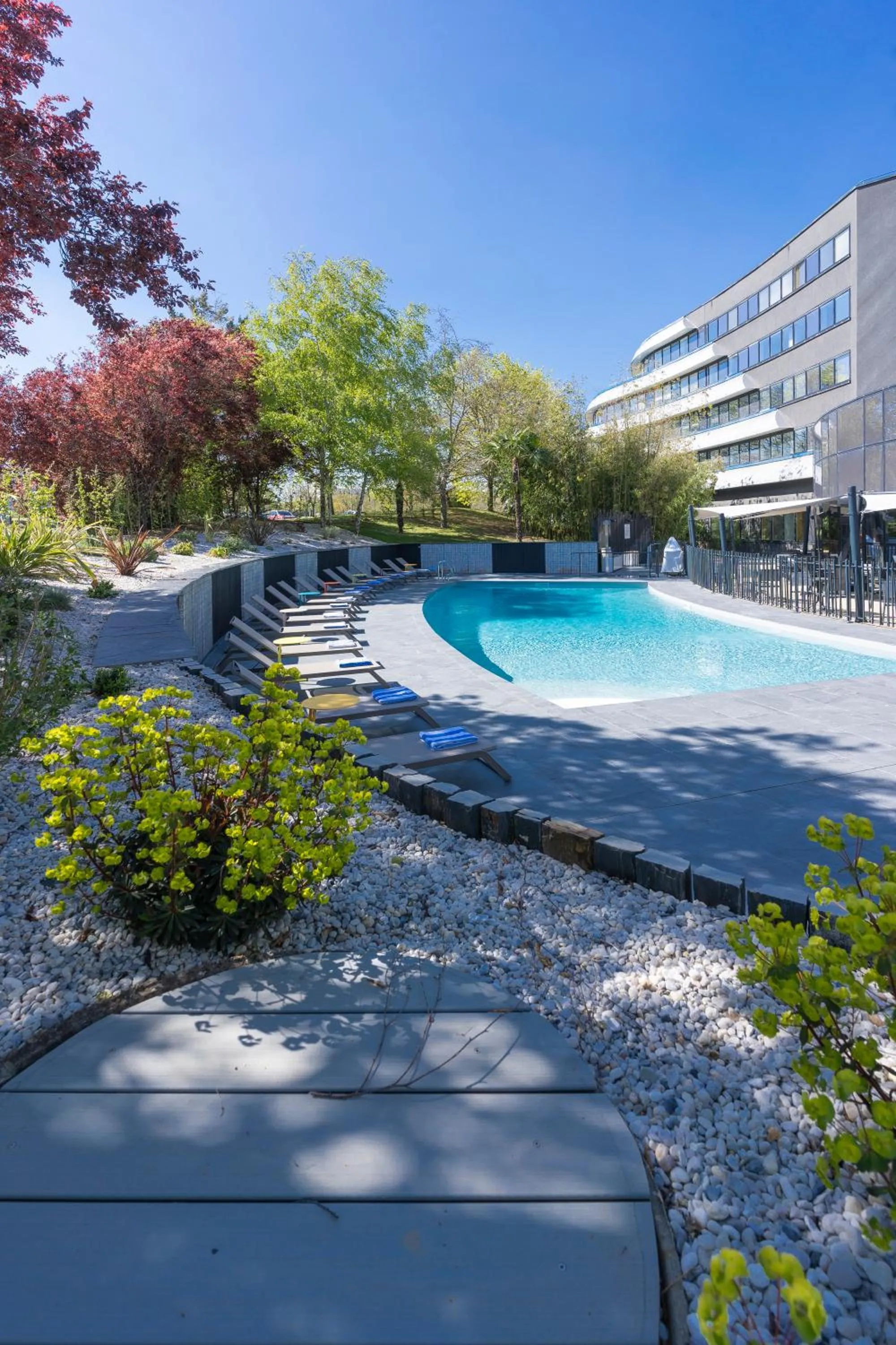 Swimming pool in Novotel Poitiers Site du Futuroscope