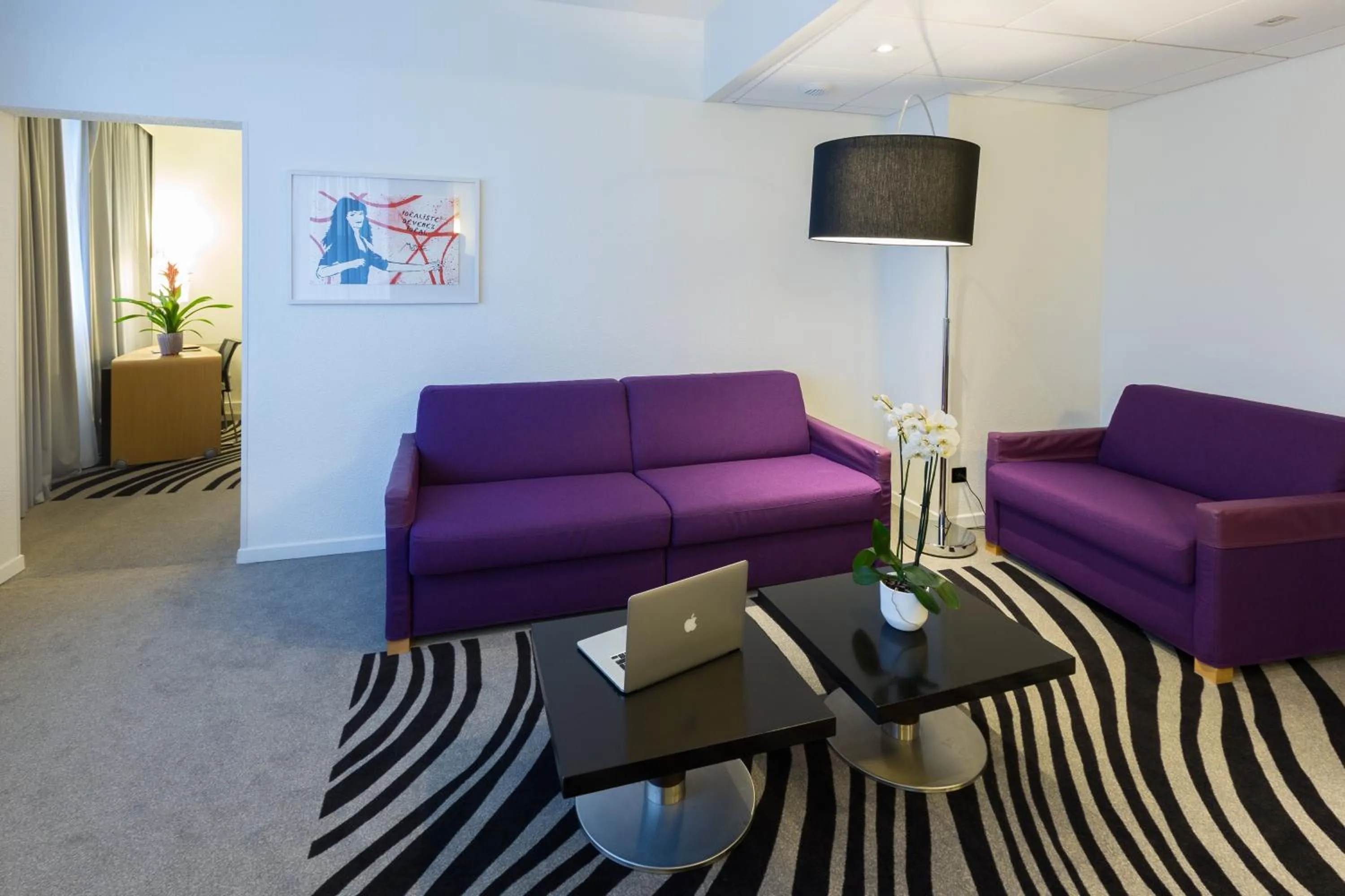 Living room in Novotel Poitiers Site du Futuroscope