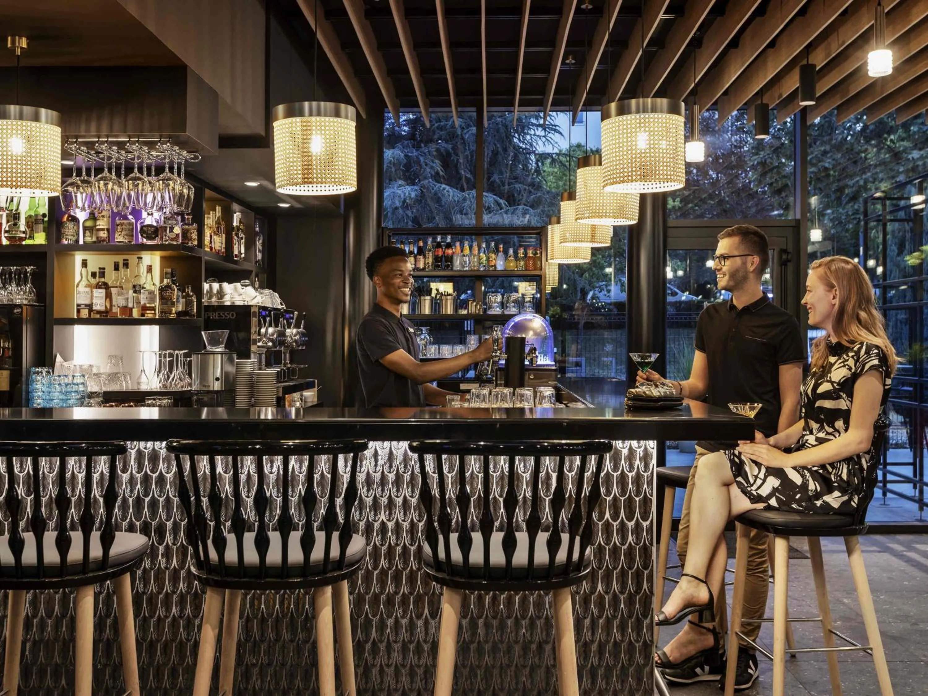 Lounge or bar in Novotel Rennes Alma