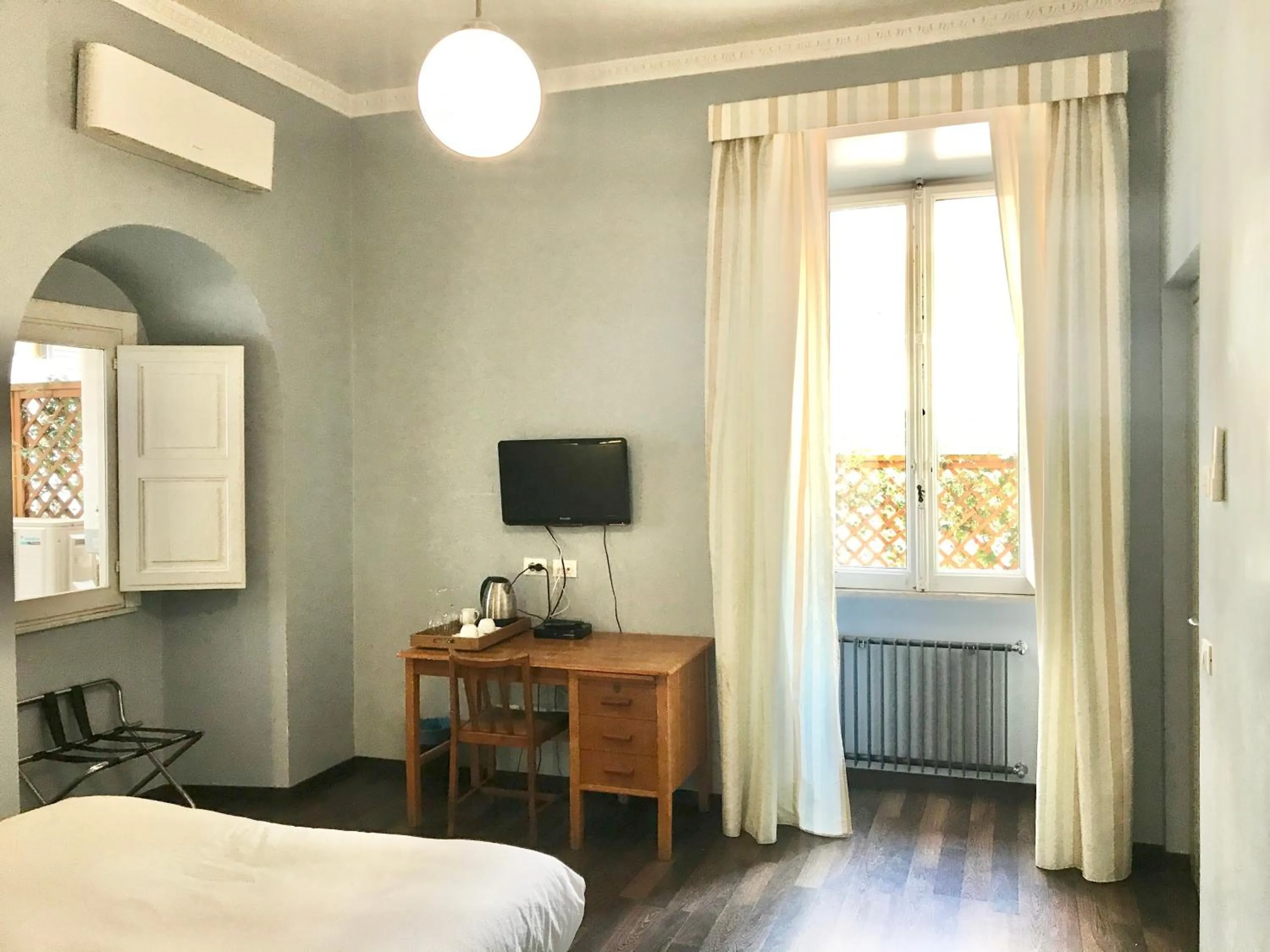 Bed in B&B Santi Quattro Al Colosseo