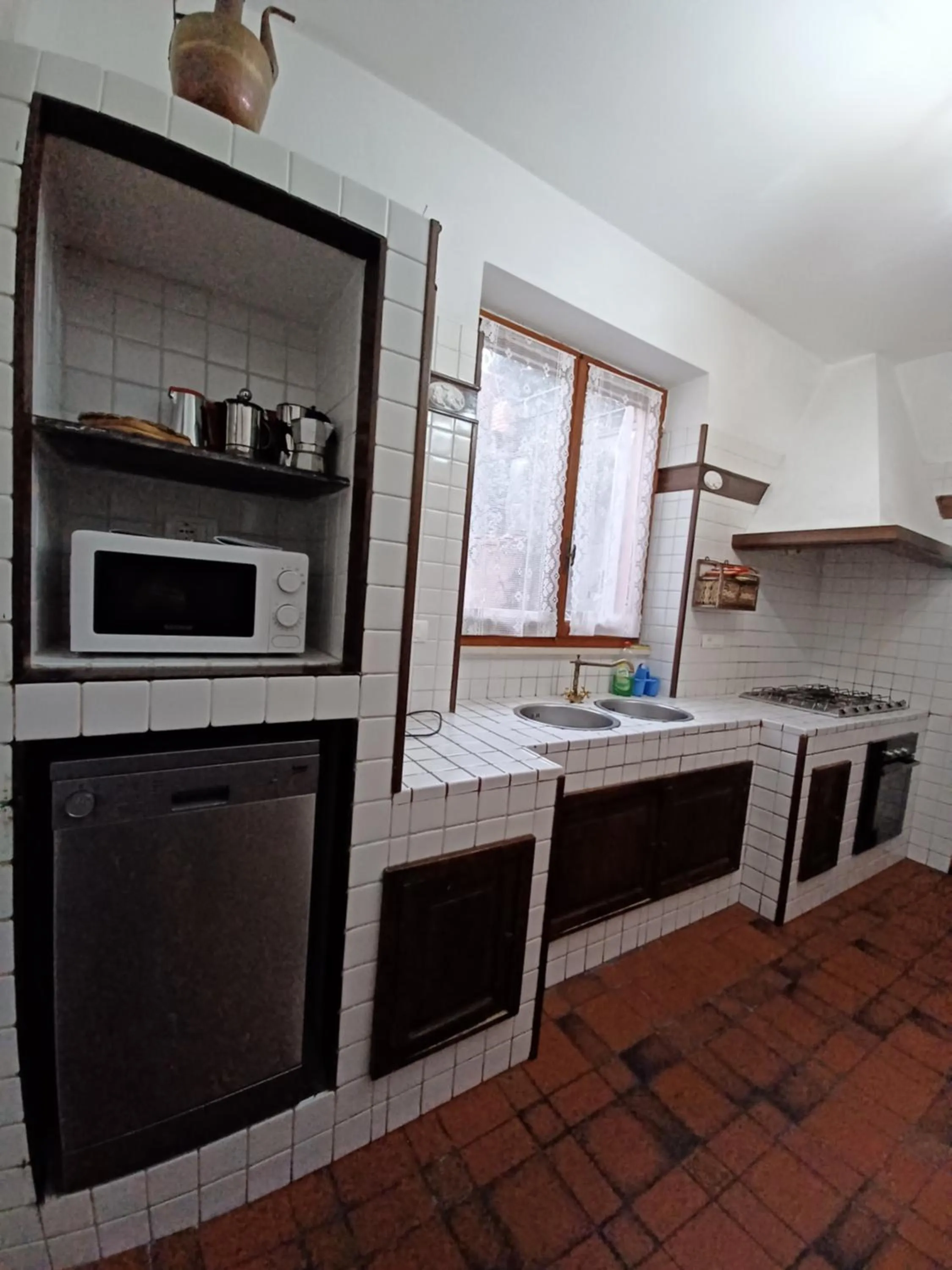Kitchen or kitchenette in Casa vancanza Sciamandola