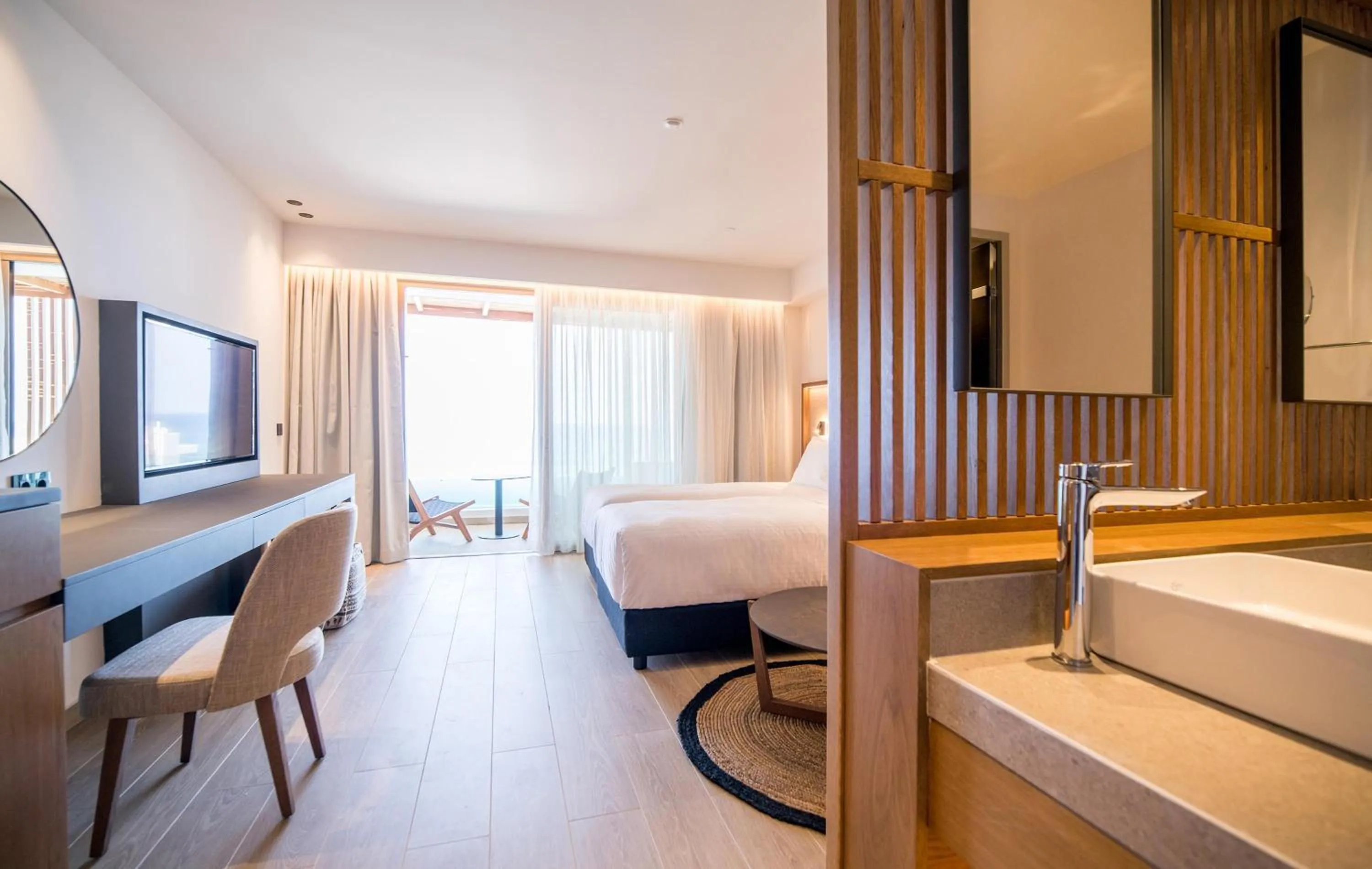 Photo of the whole room, Bed in AKASHA Beach Hotel & Spa