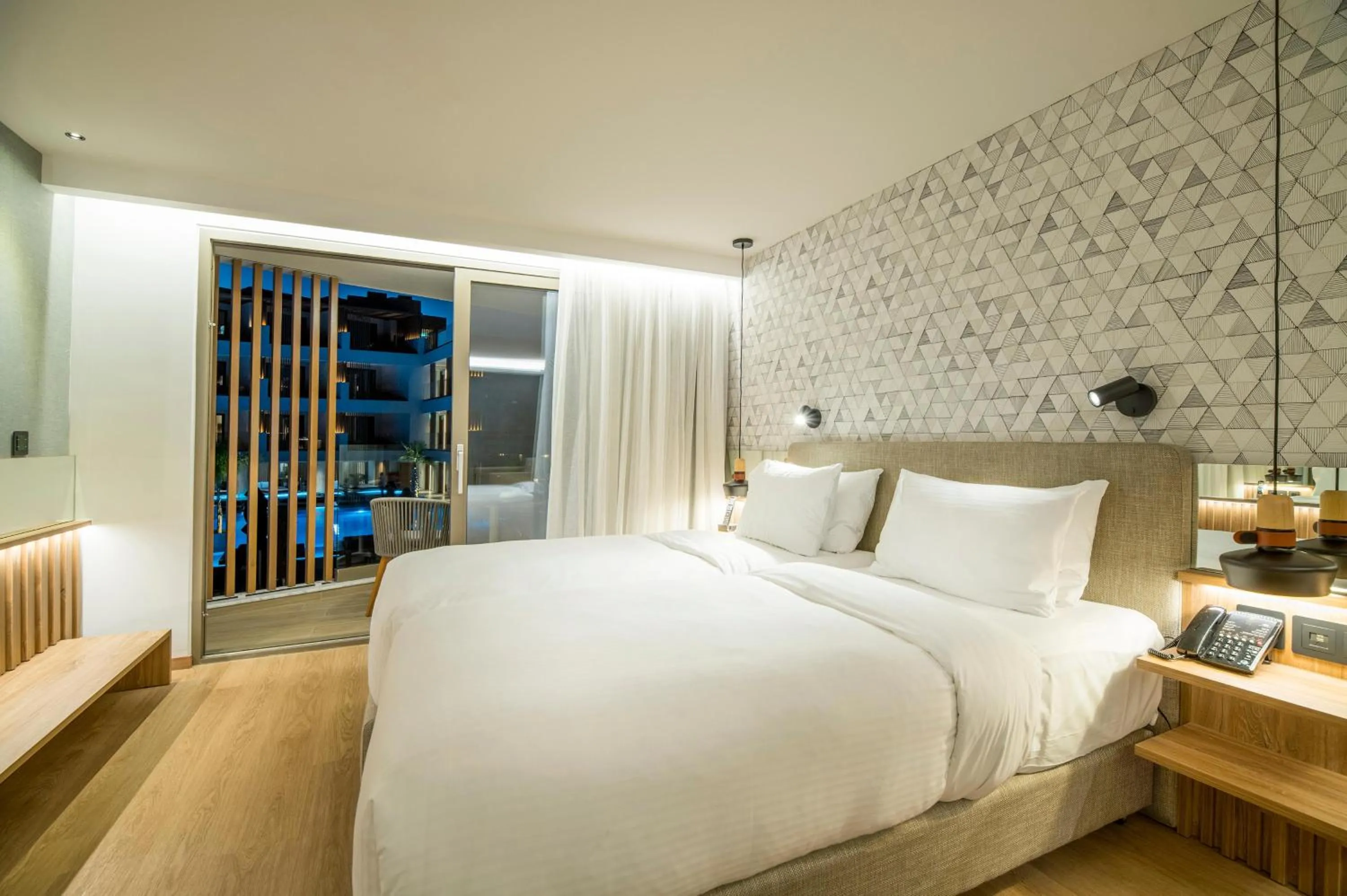 Photo of the whole room, Bed in AKASHA Beach Hotel & Spa