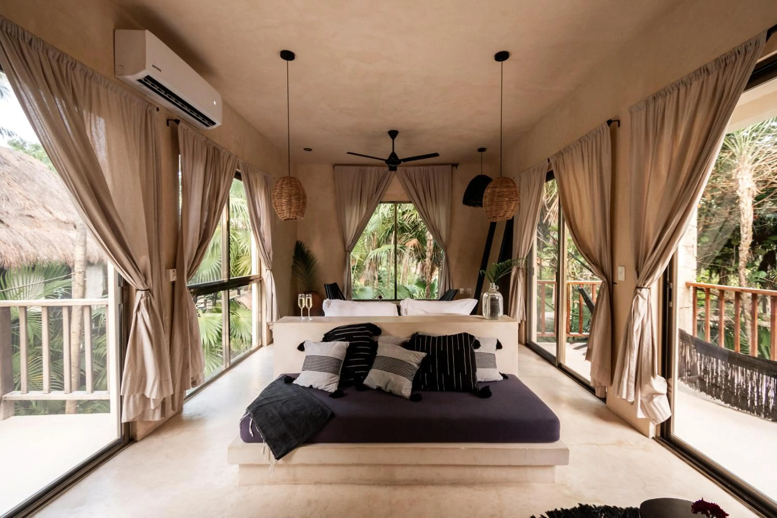 Photo of the whole room, Bed in NEST Tulum