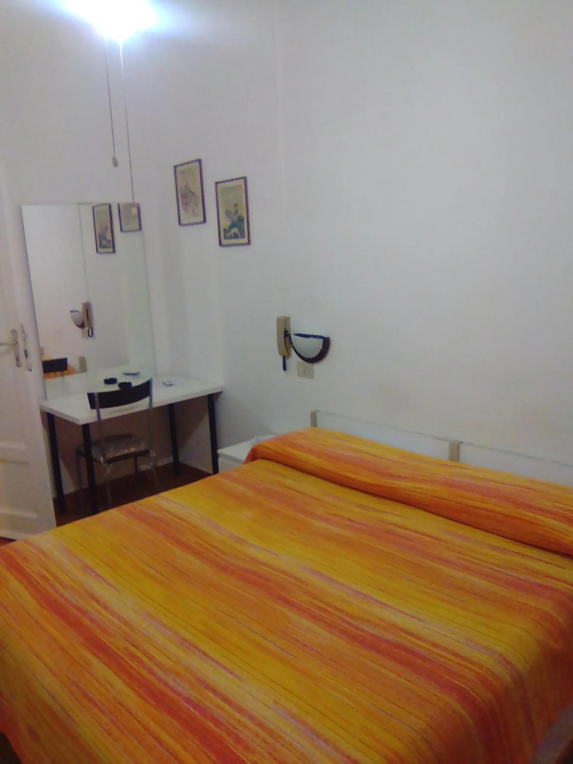 Photo of the whole room in Albergo Cavour SELF CHECK-IN