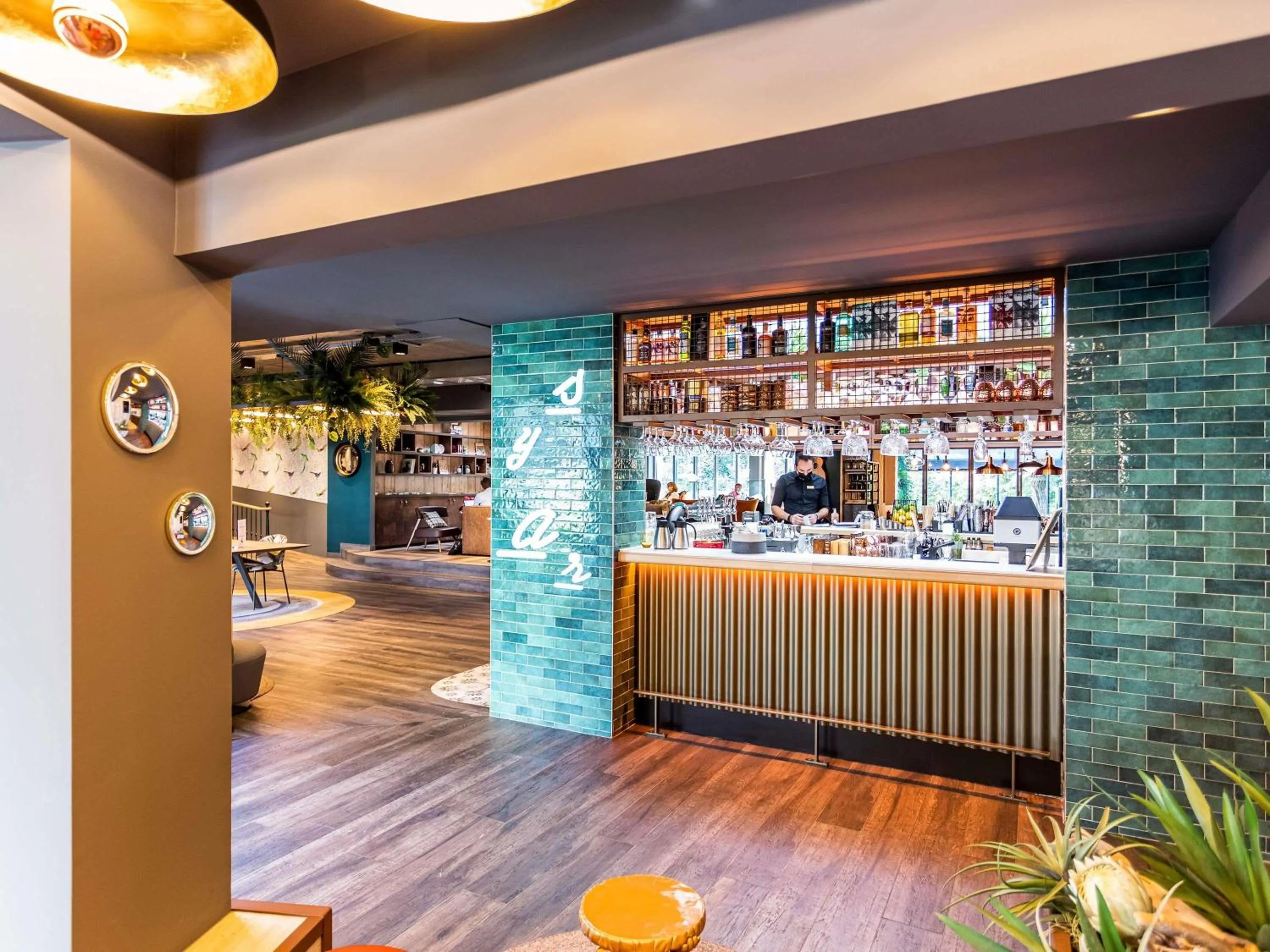 Lounge or bar in Novotel Valence Sud