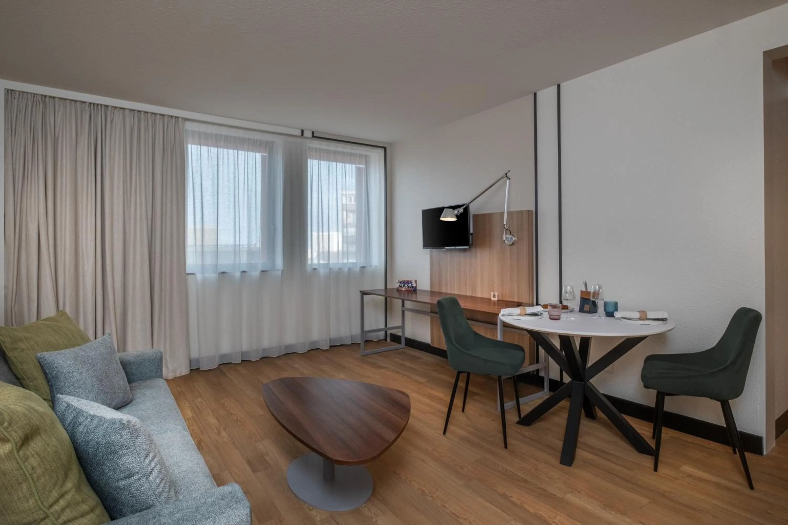 Living room in FirstName Toulouse Résidence