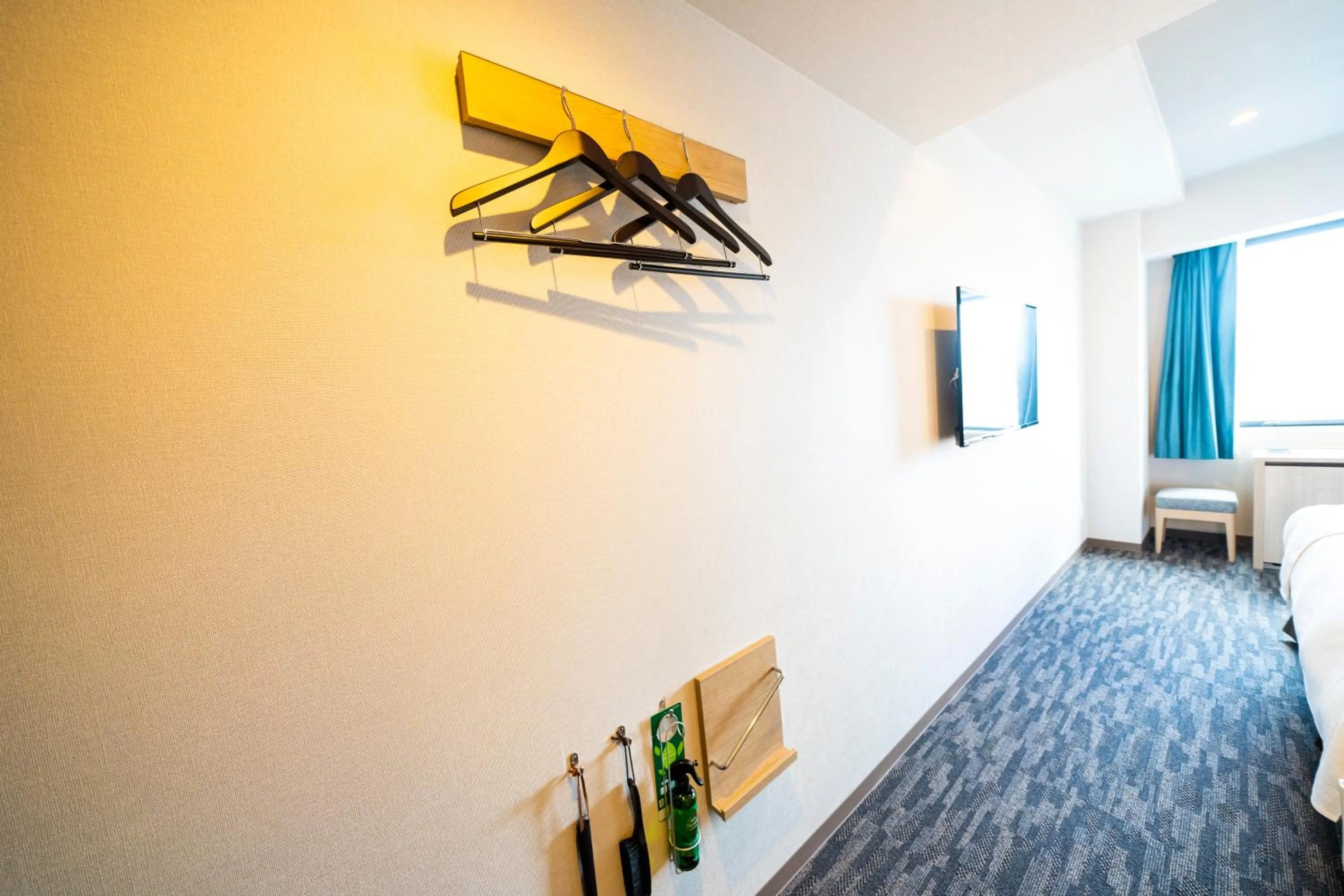 Bed in KOKO HOTEL Sapporo Odori