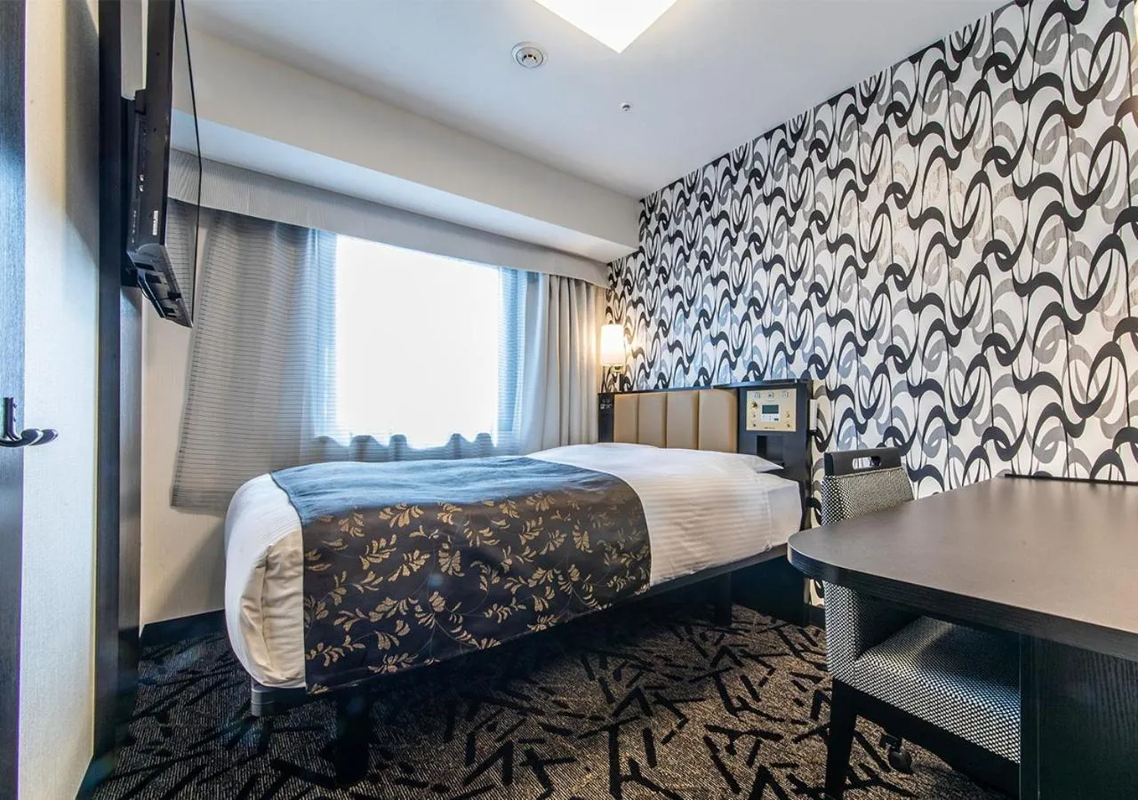 Bed in APA Hotel Kobe Sannomiya Ekimae