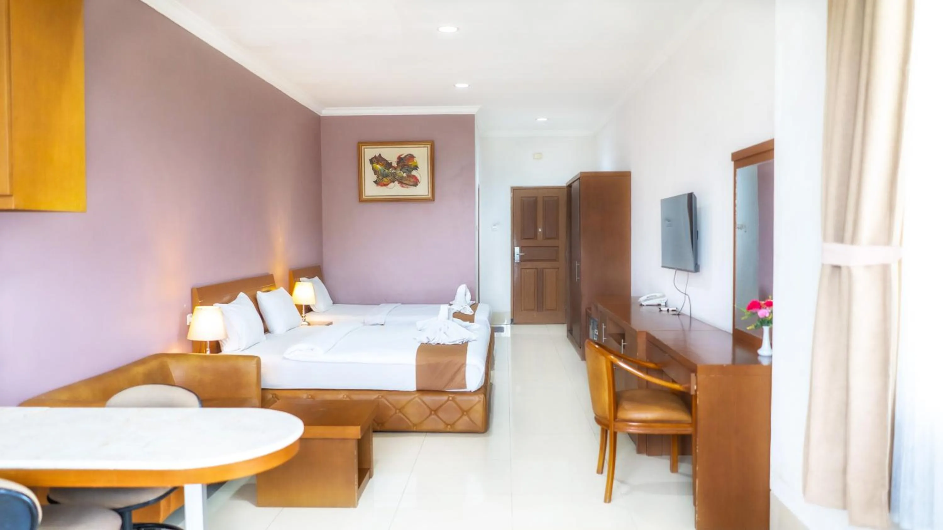 Bed in HOTEL & WISMA BINTANG JADAYAT