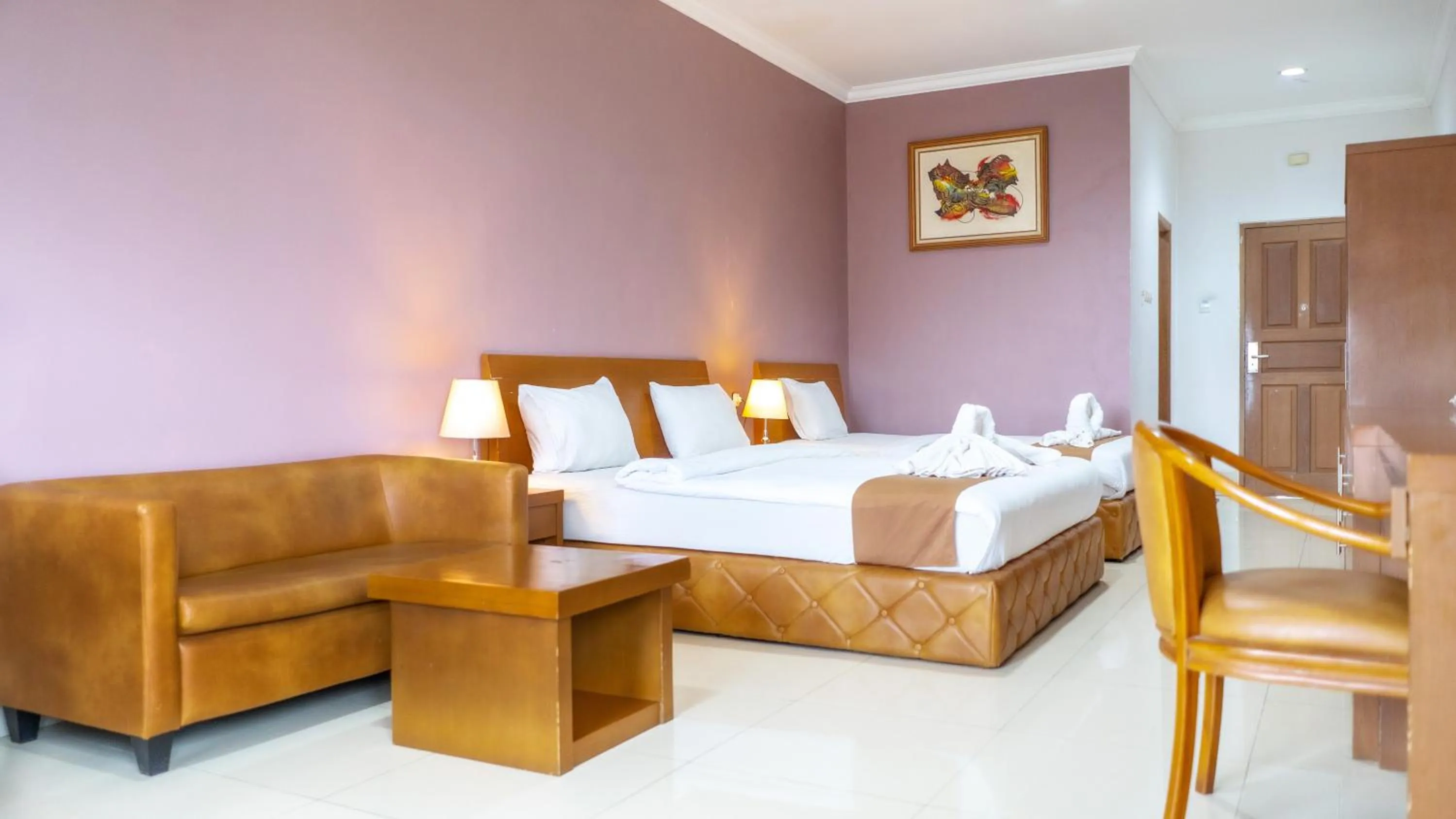 Bed in HOTEL & WISMA BINTANG JADAYAT