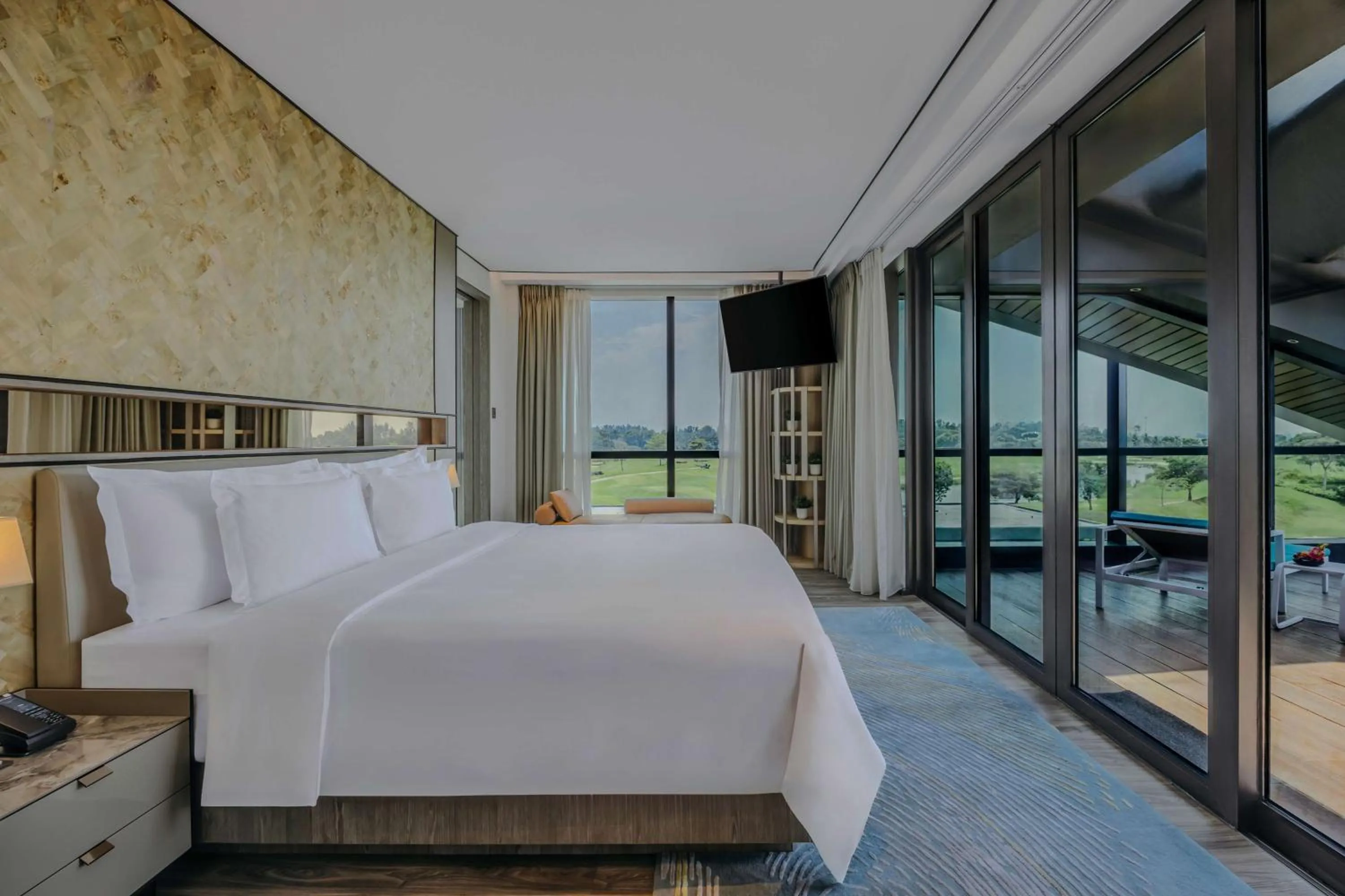 Photo of the whole room, Bed in Dusit Thani Laguna Singapore