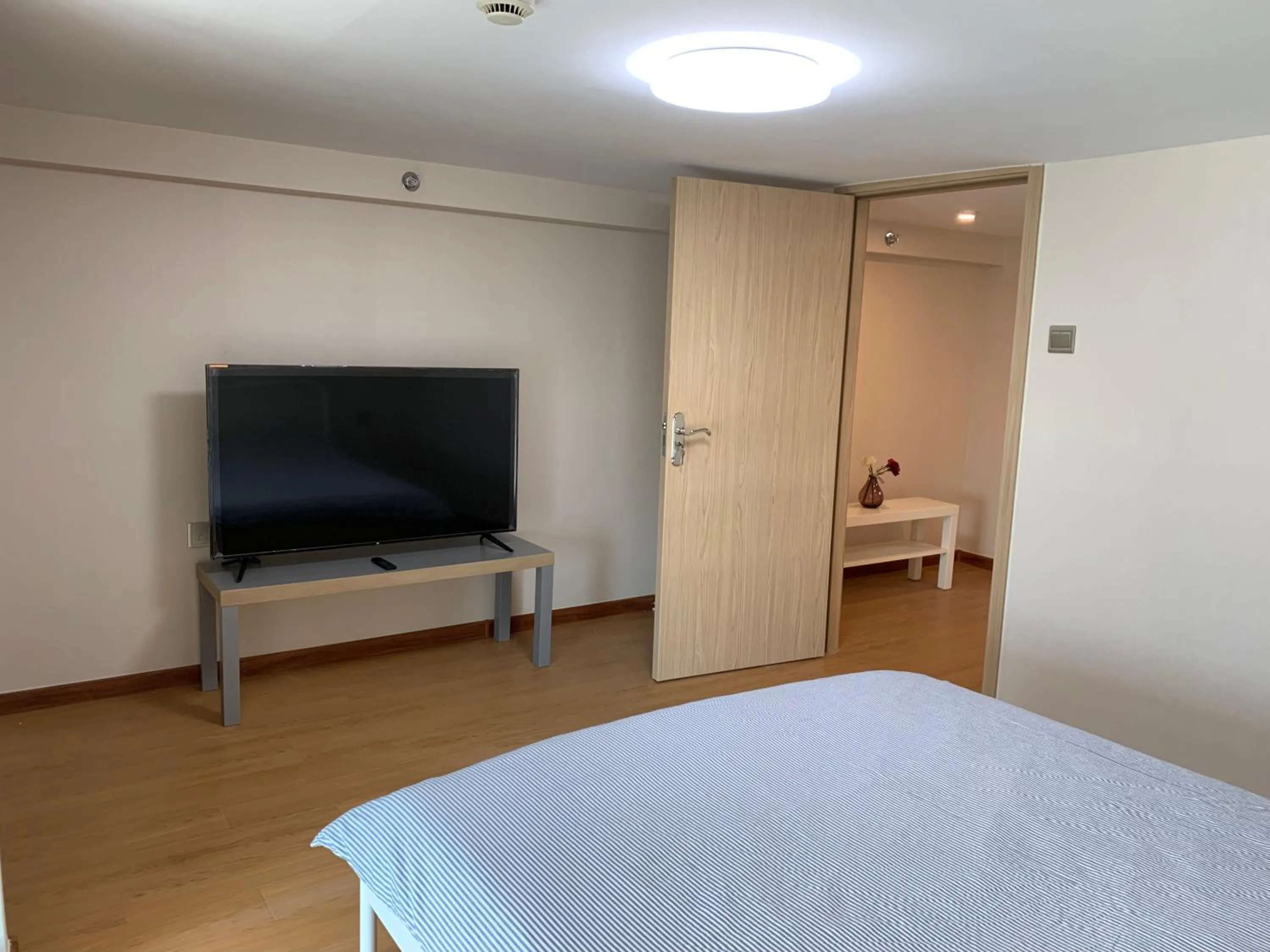 Bed in iNestin Shanghai Apt Waigaoqiao