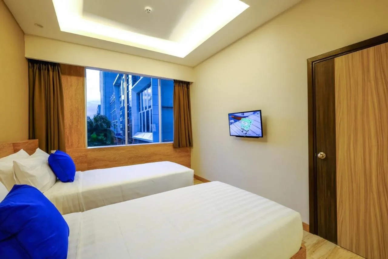 Bed in Desatu Hotel