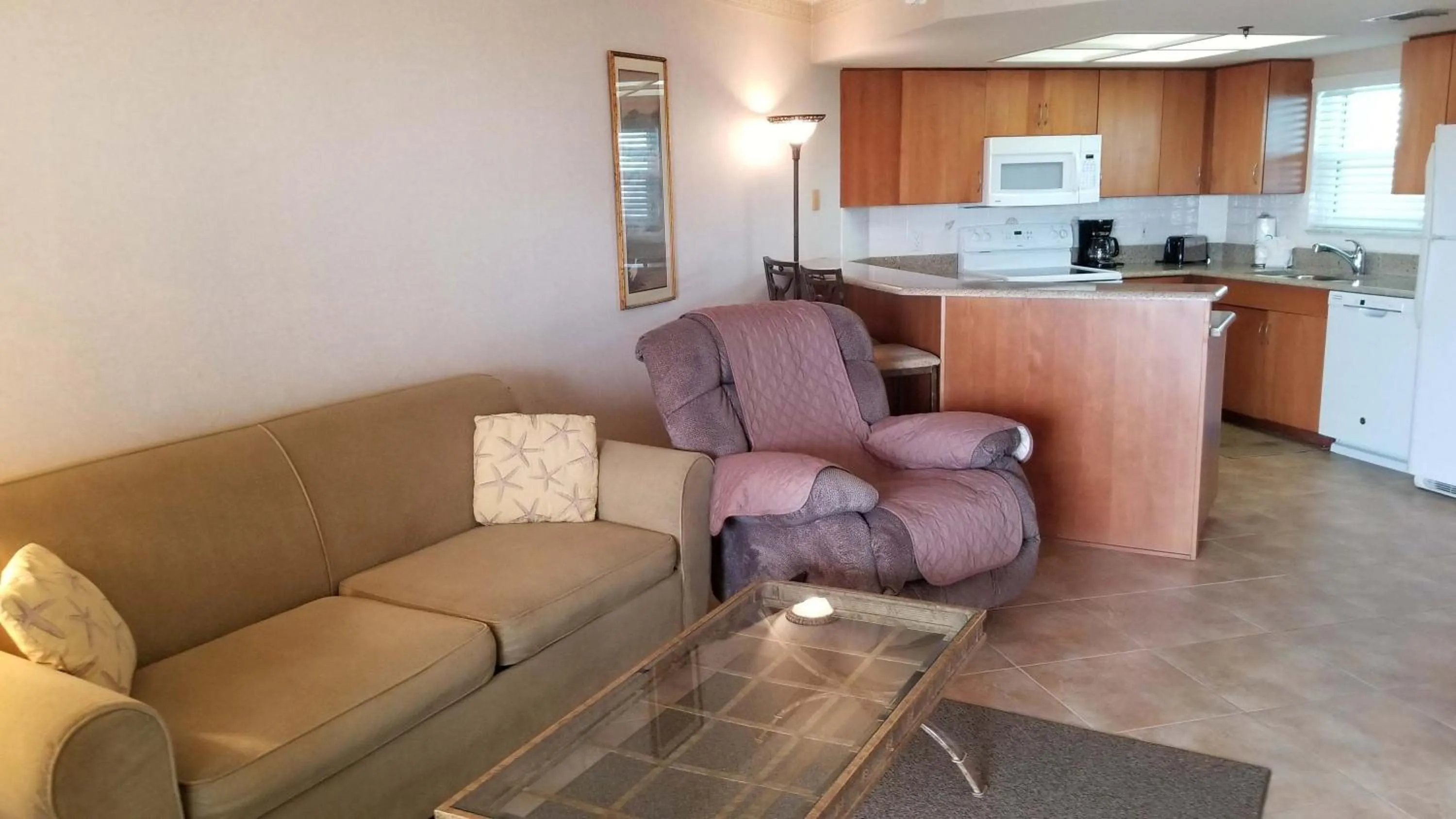 Living room in Gulf Strand Resort by Travel Resort Services