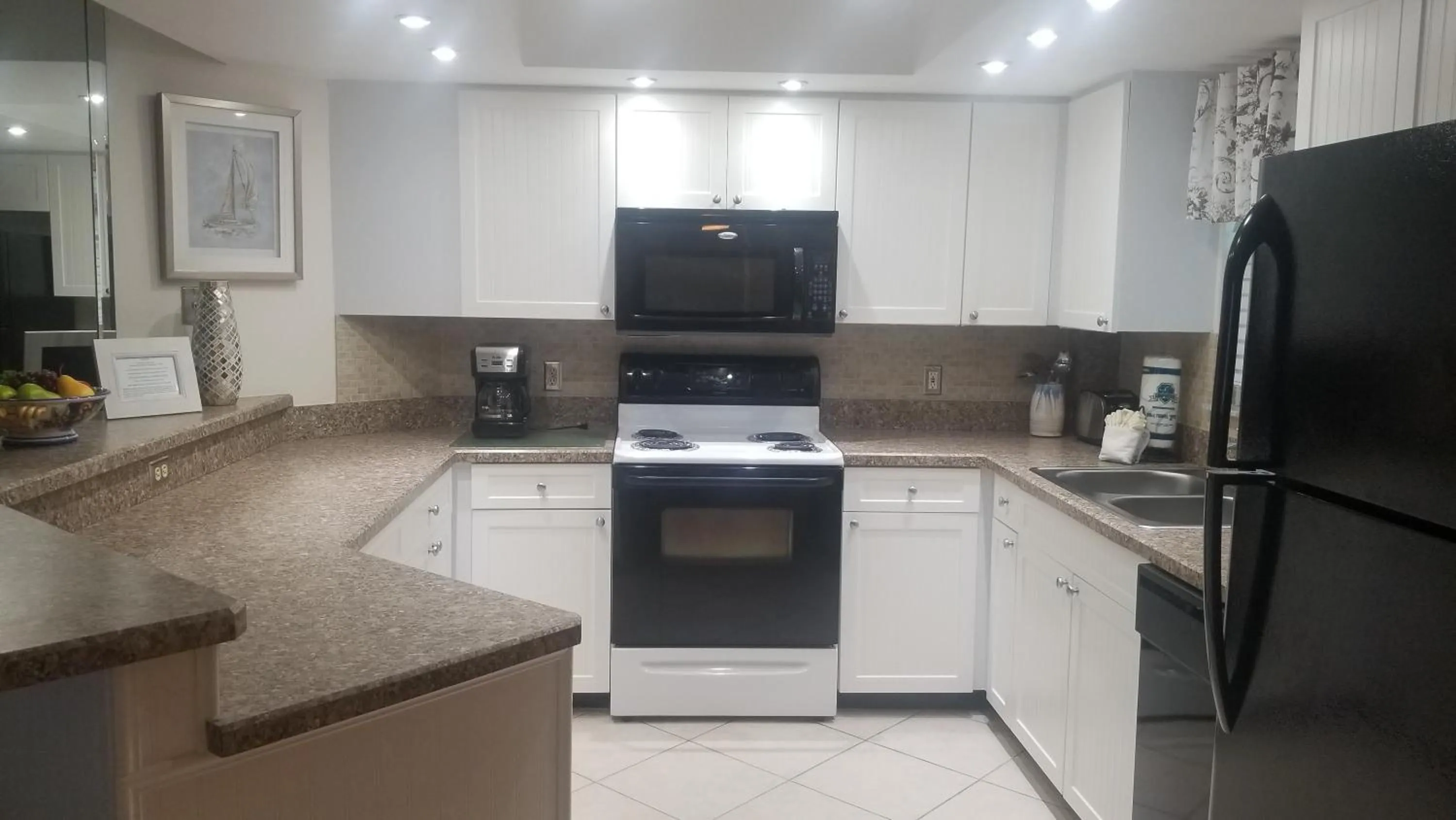 Kitchen or kitchenette in Gulf Strand Resort by Travel Resort Services