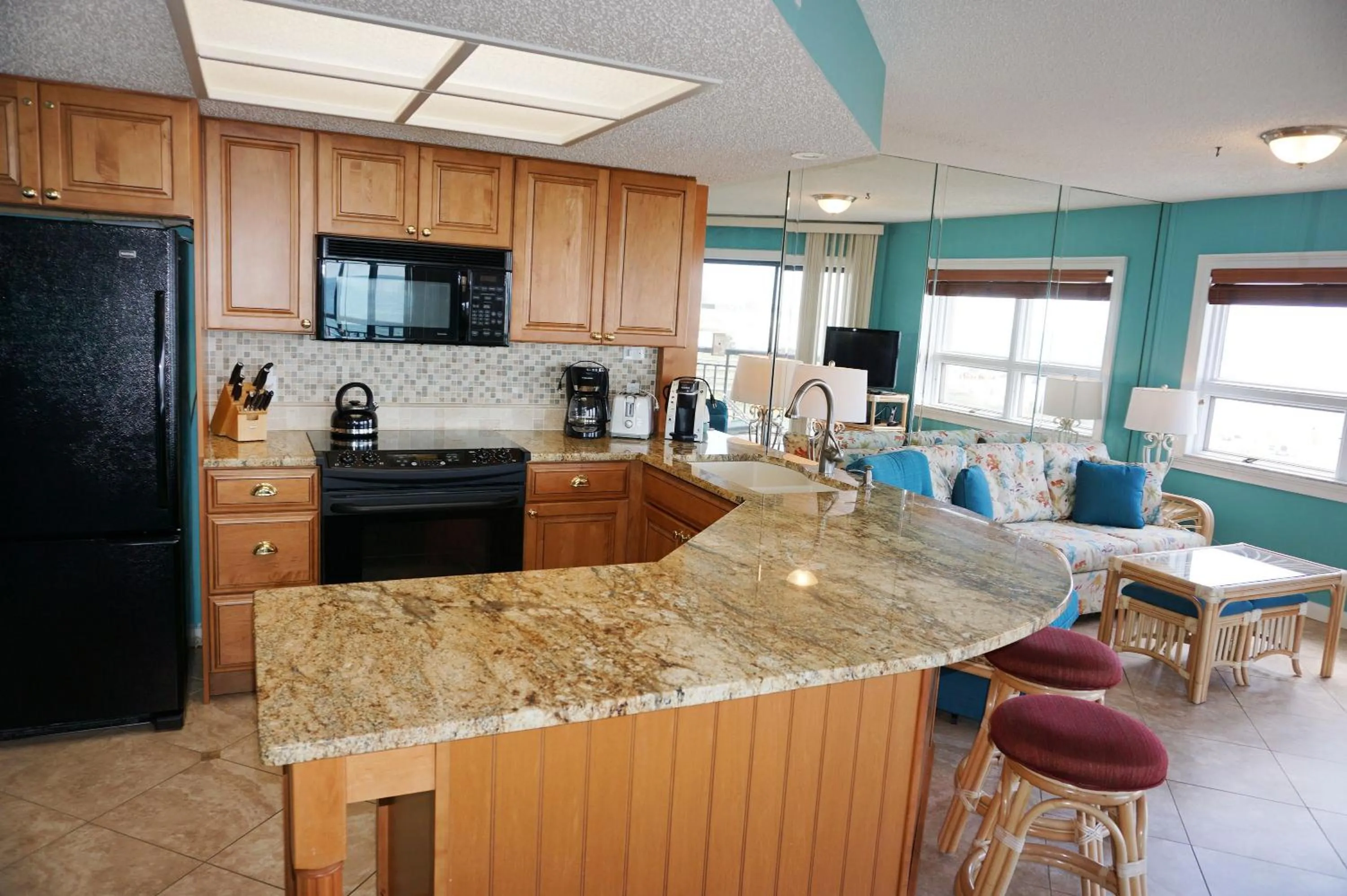 Kitchen or kitchenette in Gulf Strand Resort by Travel Resort Services