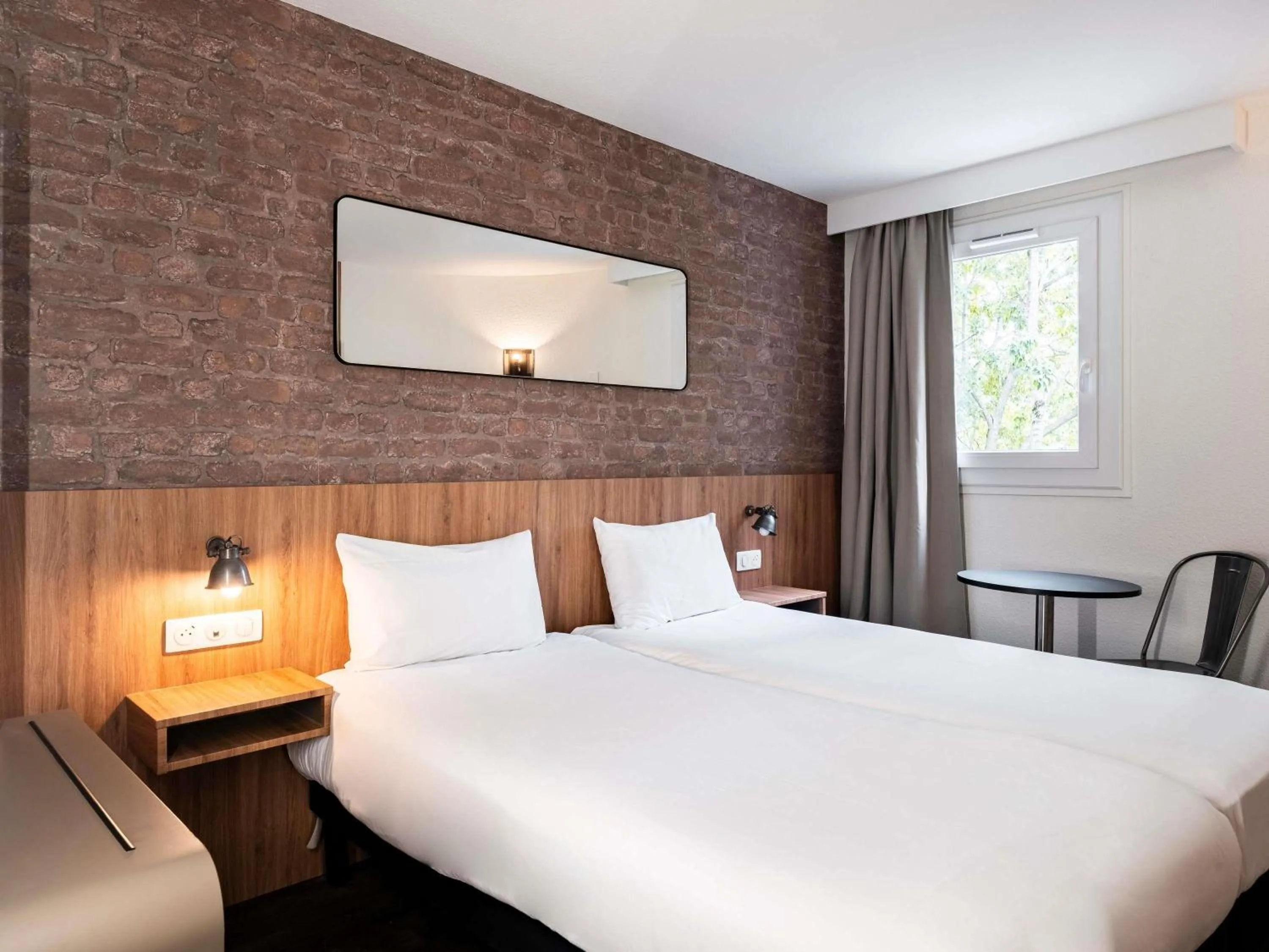 Bed in Ibis Styles Lyon Villeurbanne Parc de la Tête d'Or