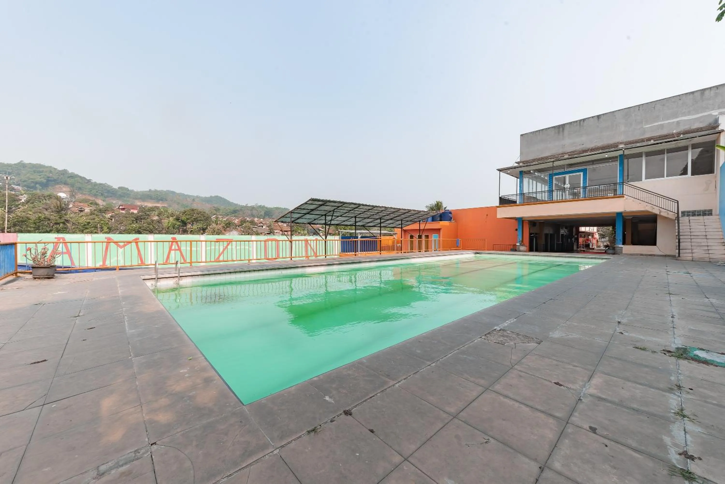 Swimming pool in RedDoorz Syariah At Cibadak Sukabumi