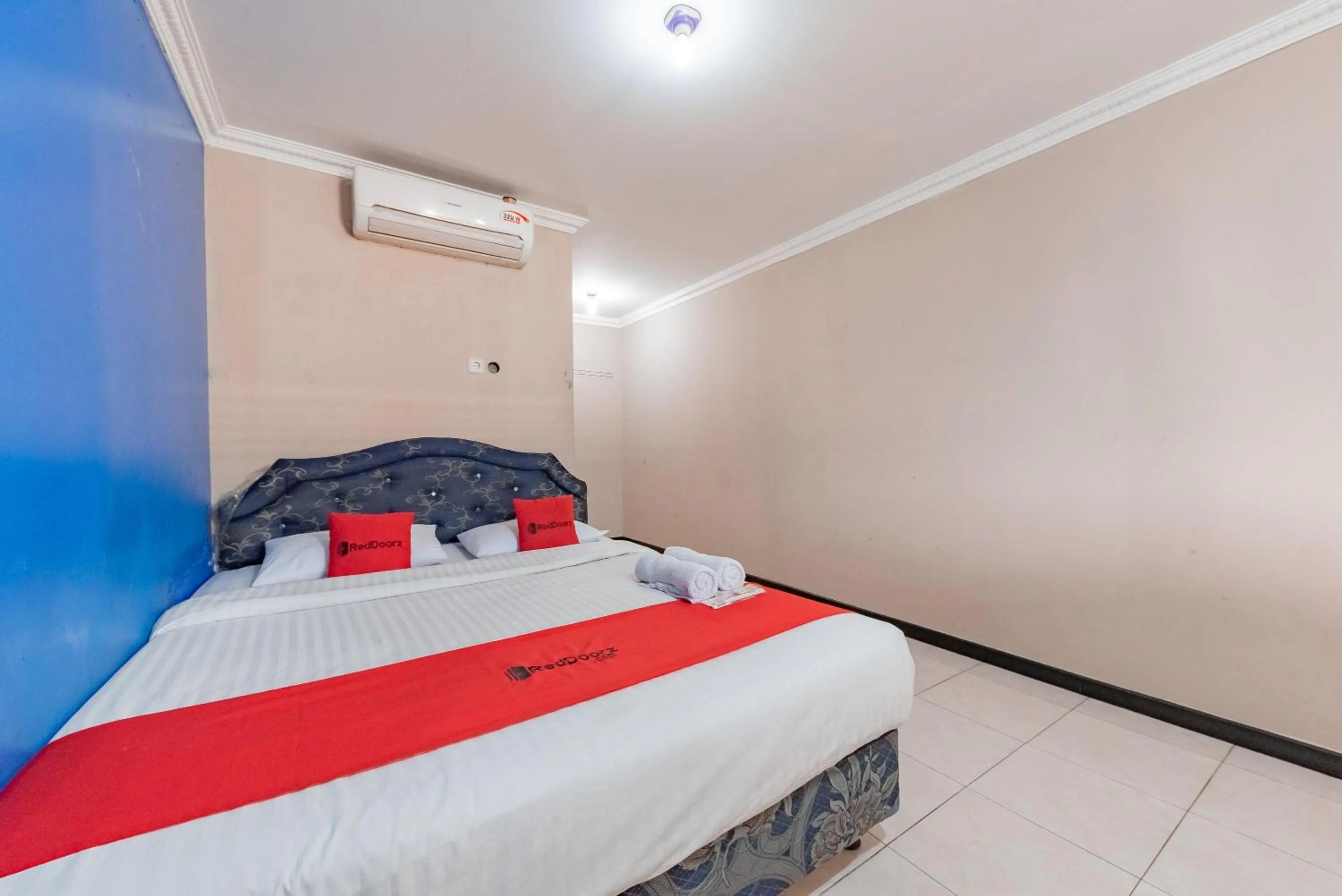 Bed in RedDoorz Syariah At Cibadak Sukabumi