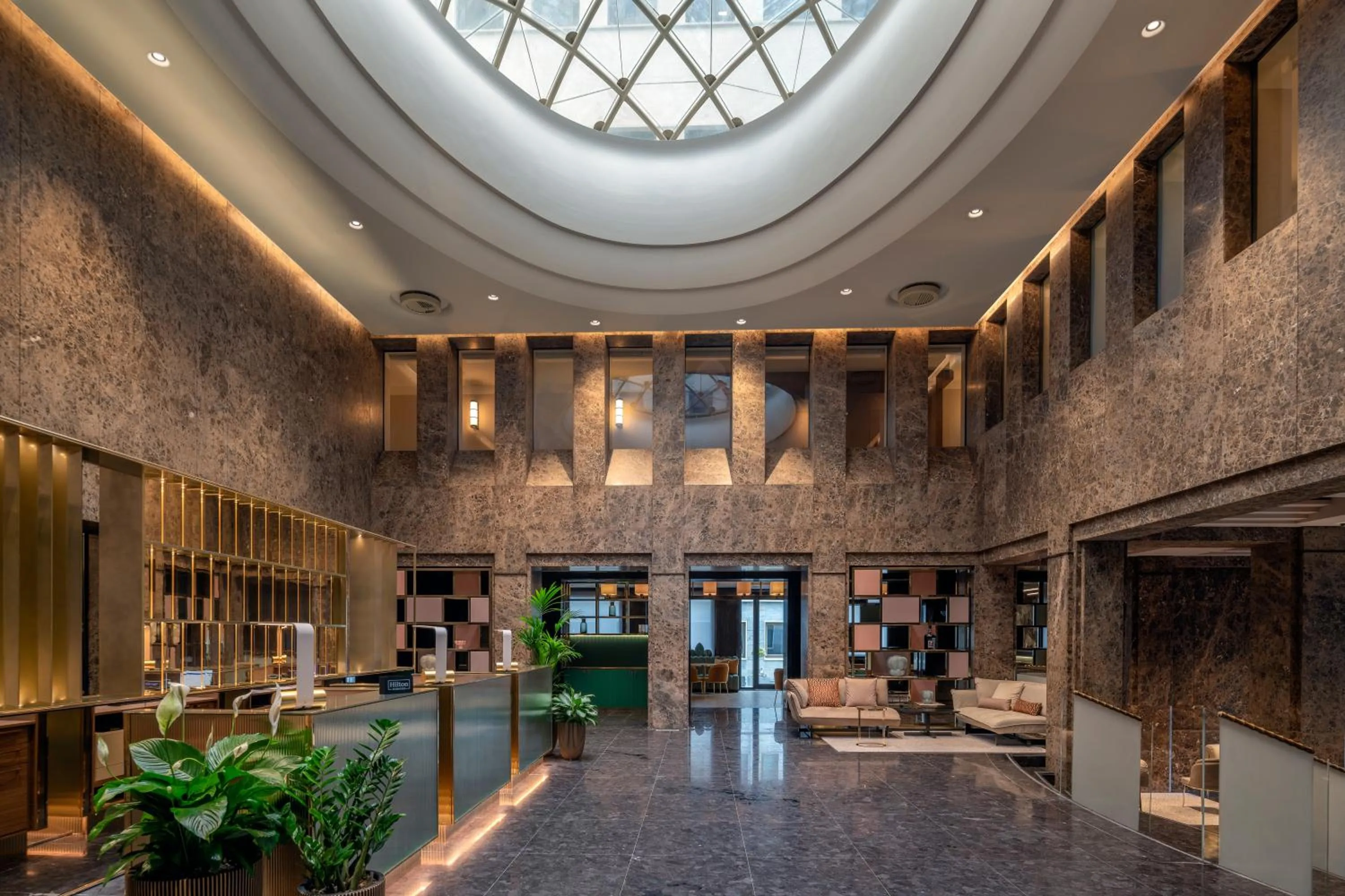 Lobby or reception in Hilton Turin Centre