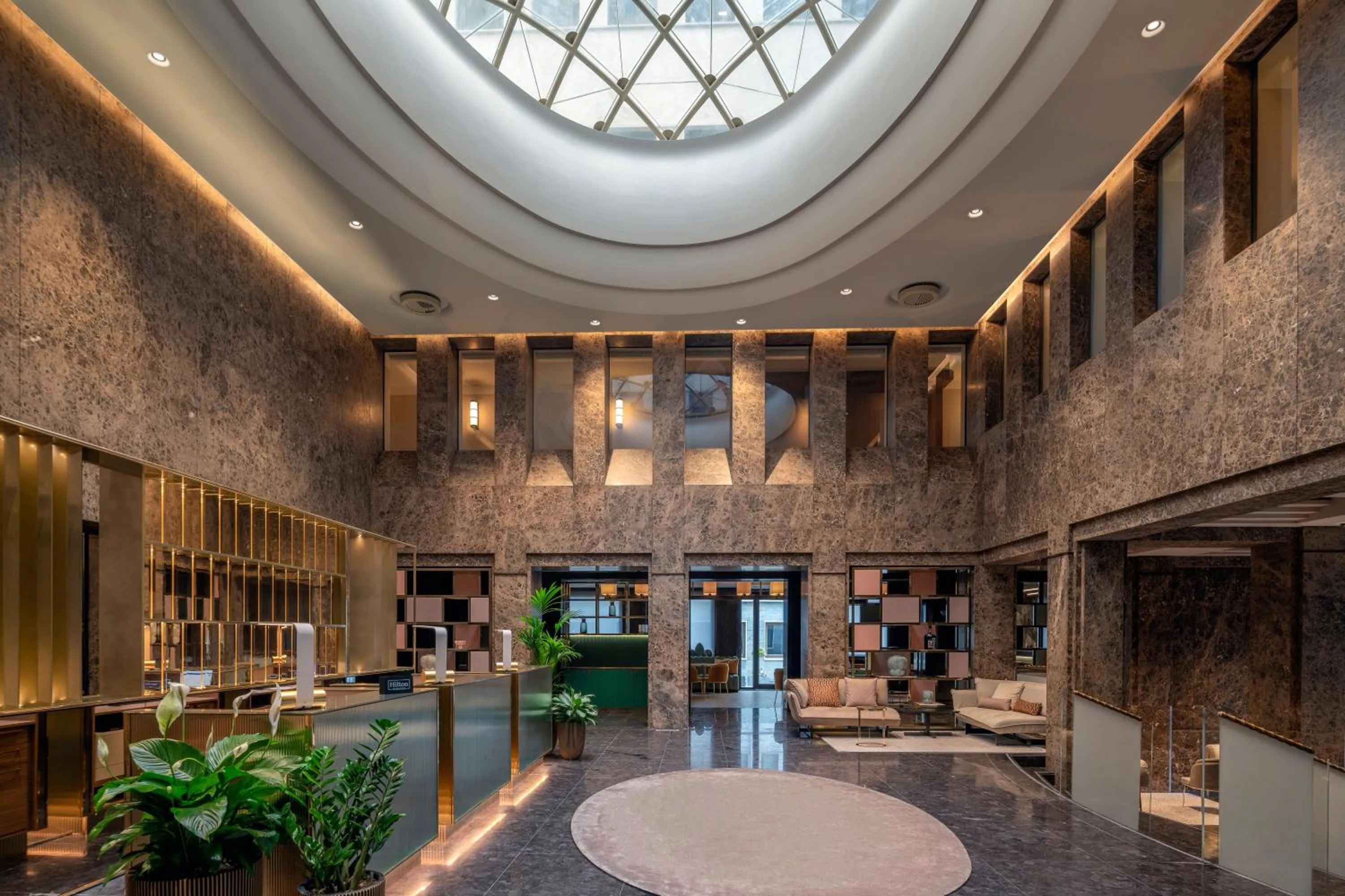 Lobby or reception in Hilton Turin Centre