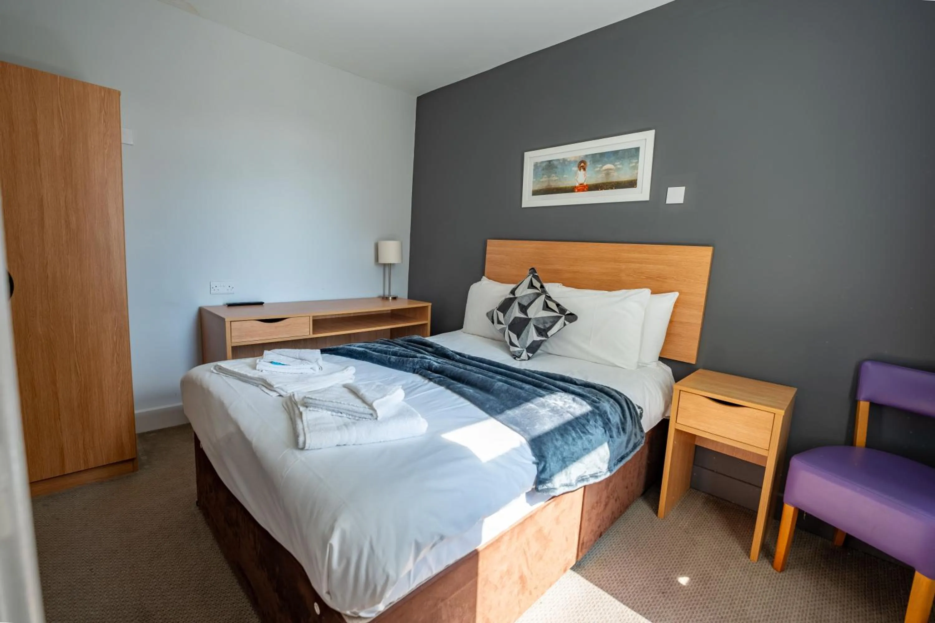 Bed in The Strathmore Hotel