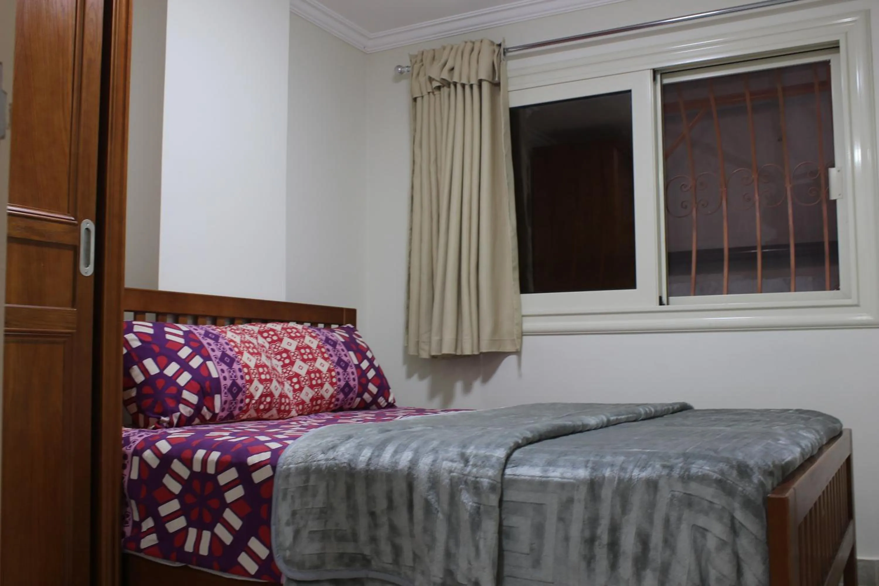 Bedroom, Bed in Al Raya Apartments