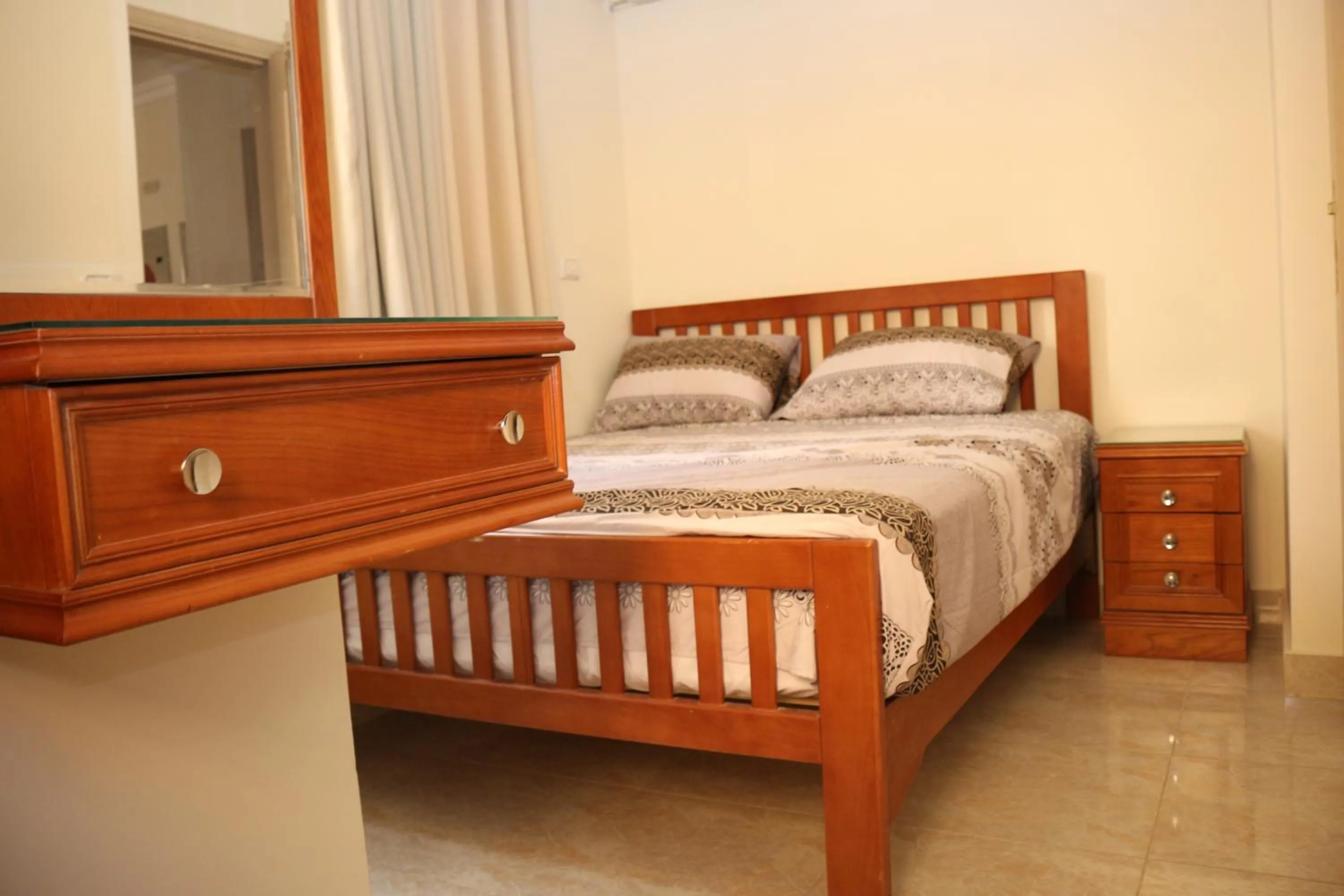 Bedroom, Bed in Al Raya Apartments
