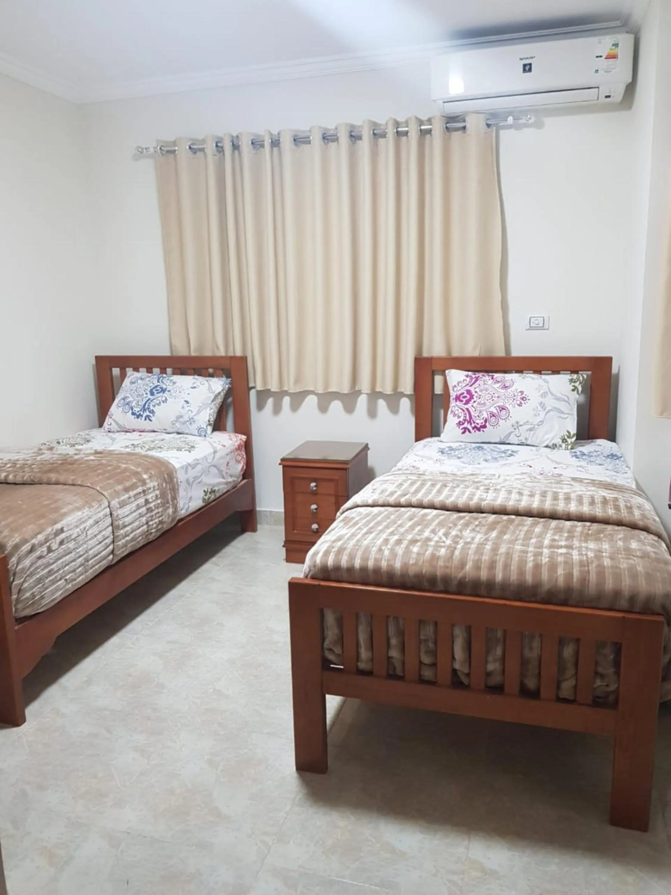 Bedroom, Bed in Al Raya Apartments