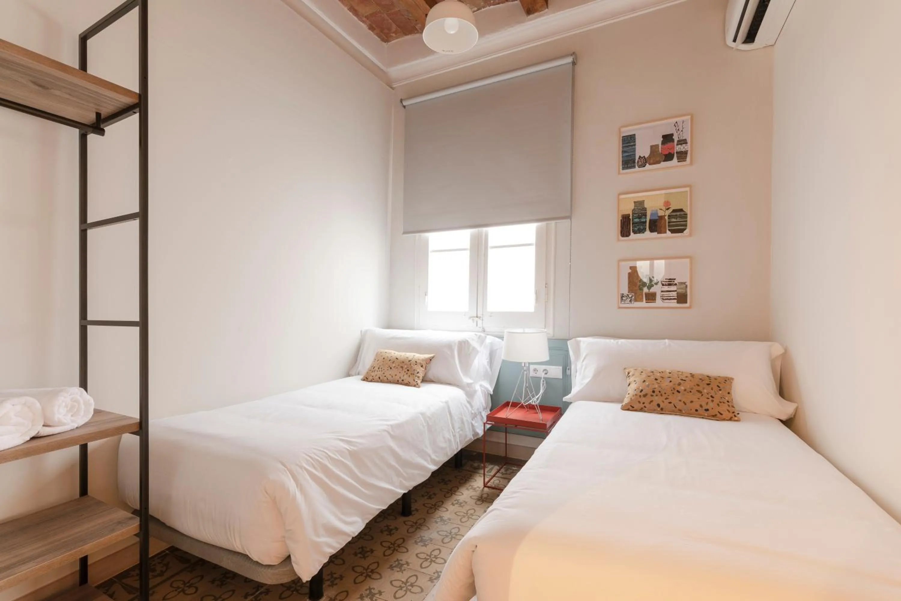 Bed in Aspasios Gracia Apartments