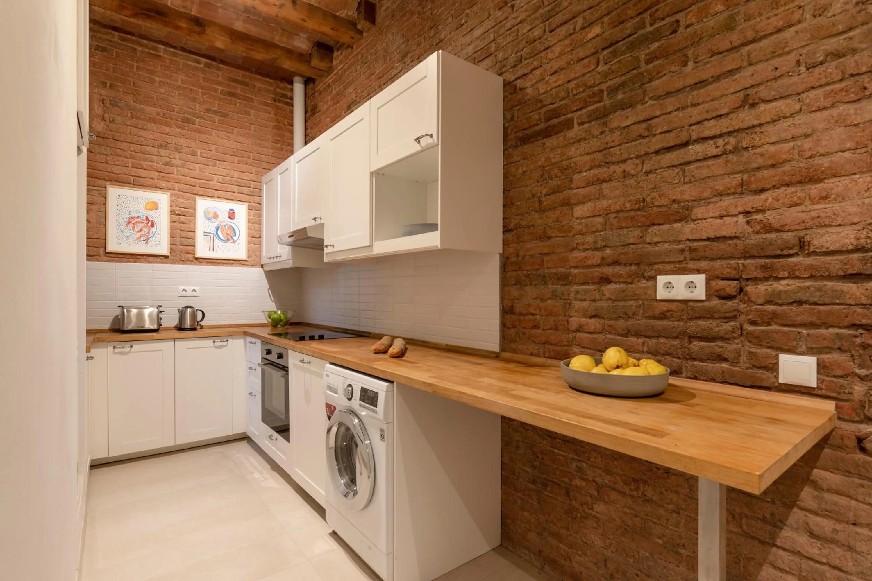 Kitchen or kitchenette in Aspasios Gracia Apartments
