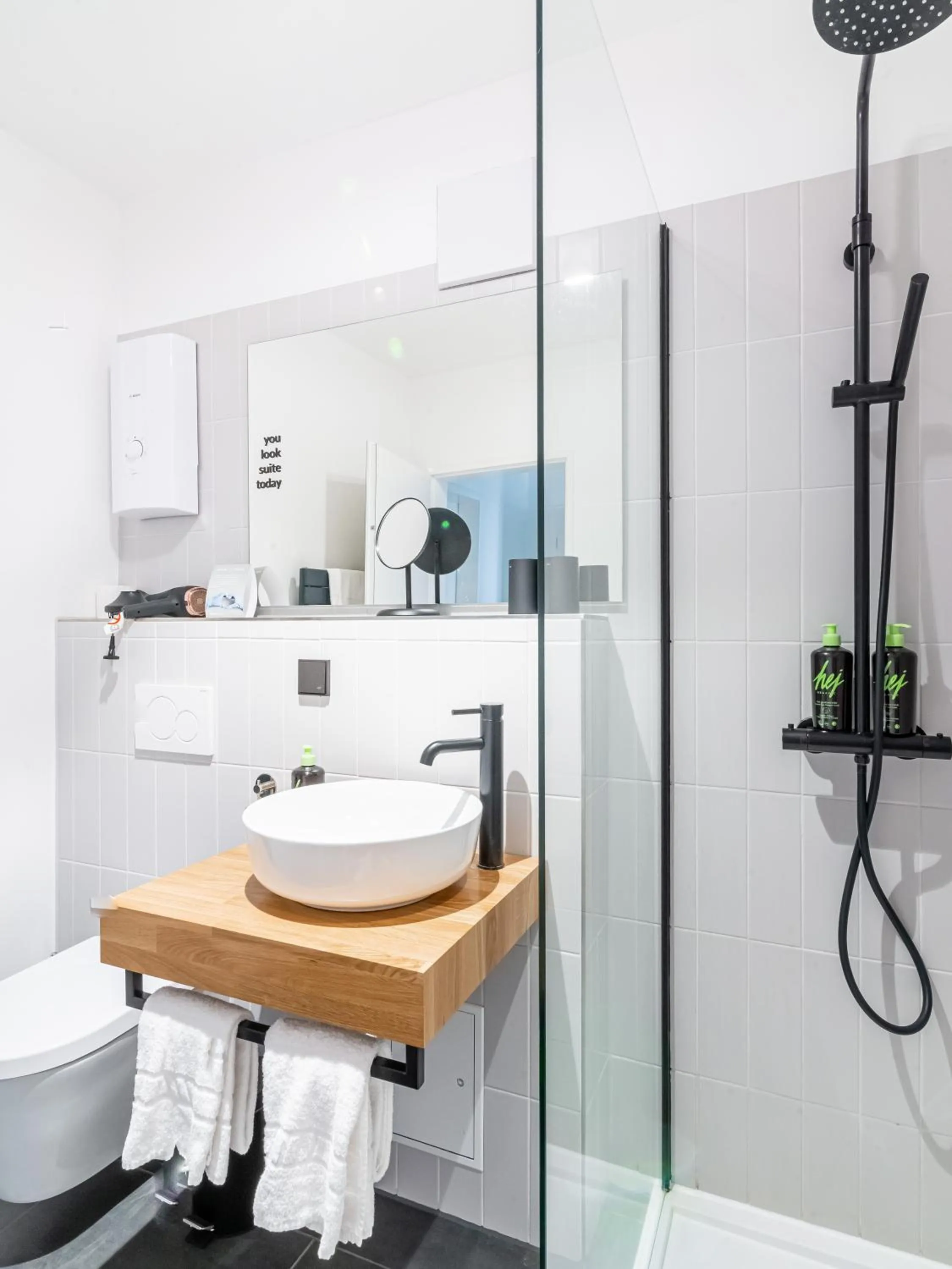 Shower in Limehome Wolfsburg Porschestraße