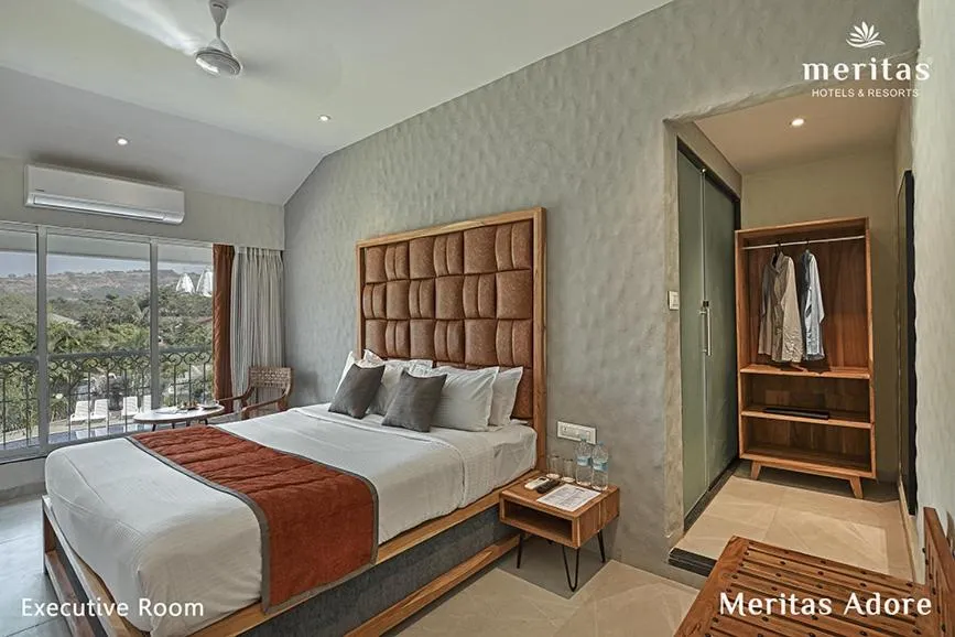 Bed in Meritas Adore Resort