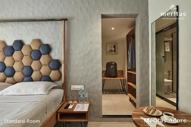 Bed in Meritas Adore Resort