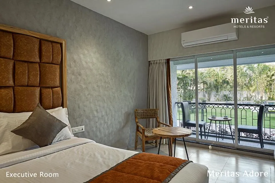 Bed in Meritas Adore Resort