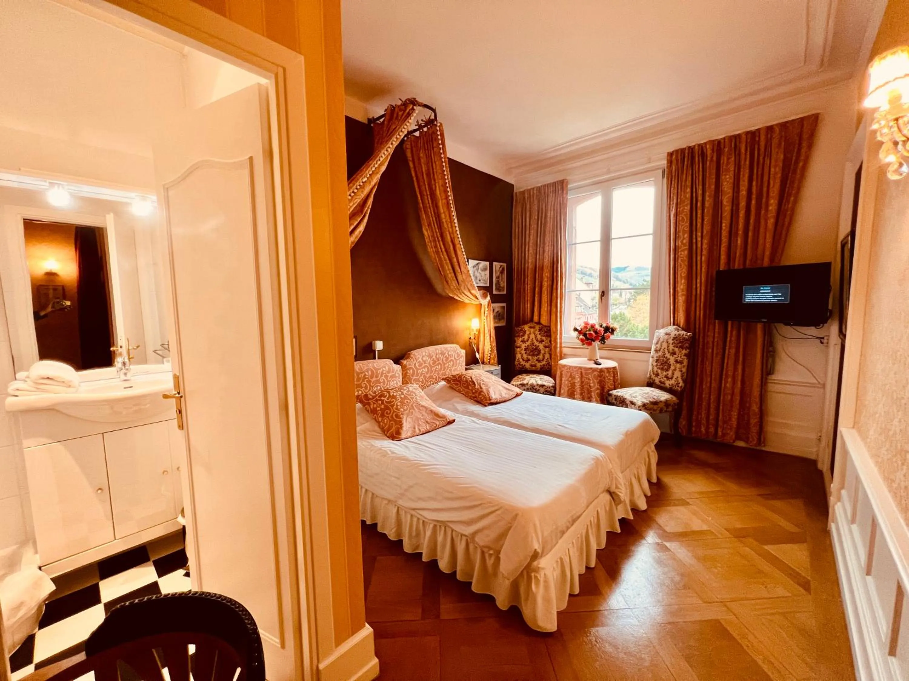 Bed in Hôtel Le Manoir