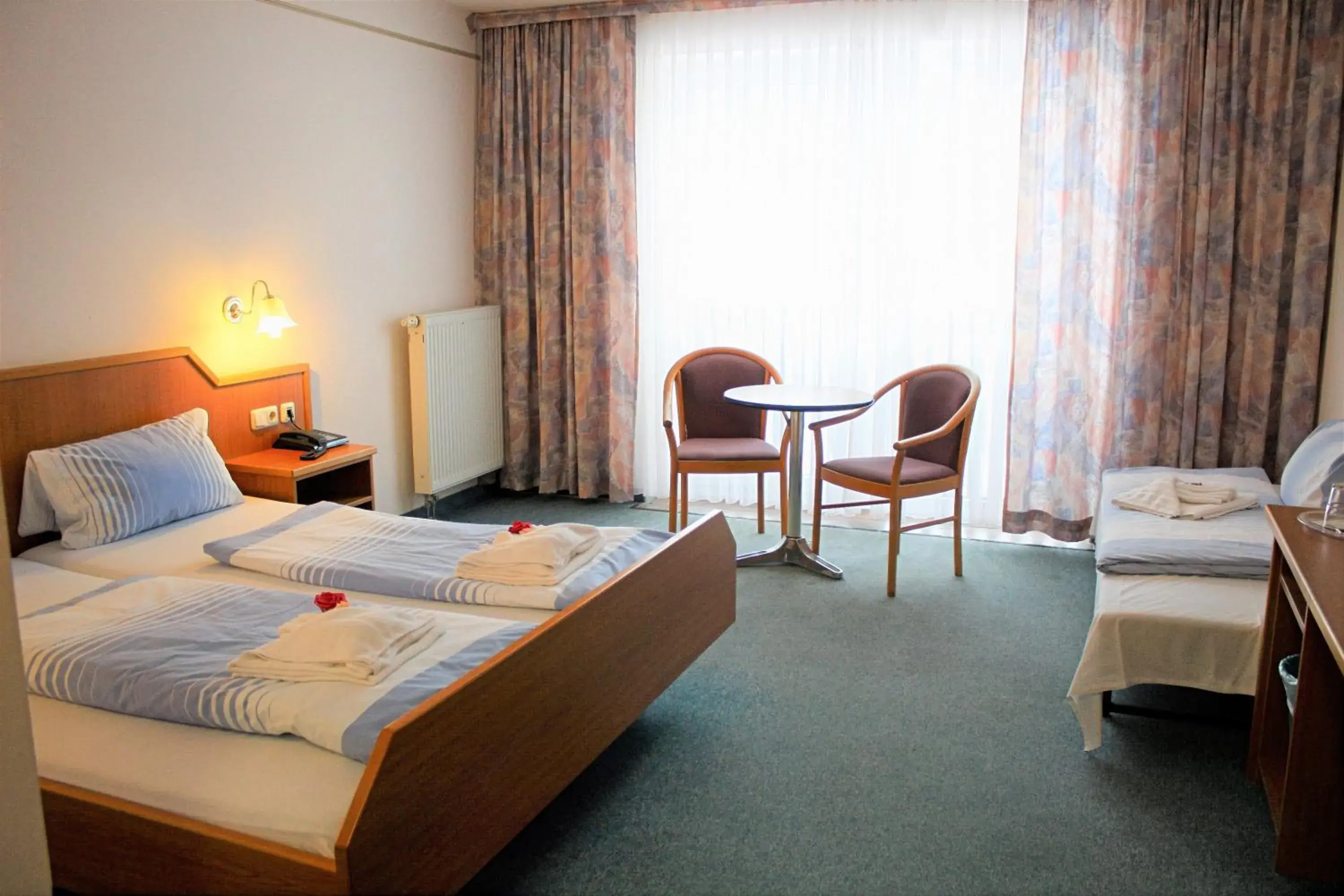 Double Room with Extra Bed in Waldhotel Feldbachtal Double Room with Extra Bed in Waldhotel Feldbachtal