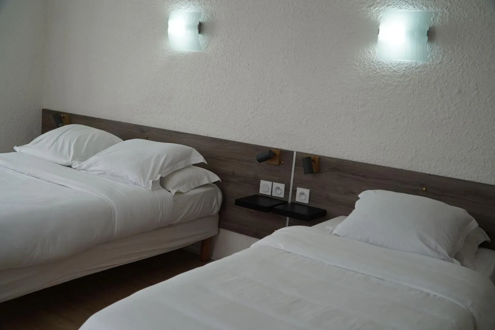 Bed in Cit'Hotel du Tigre