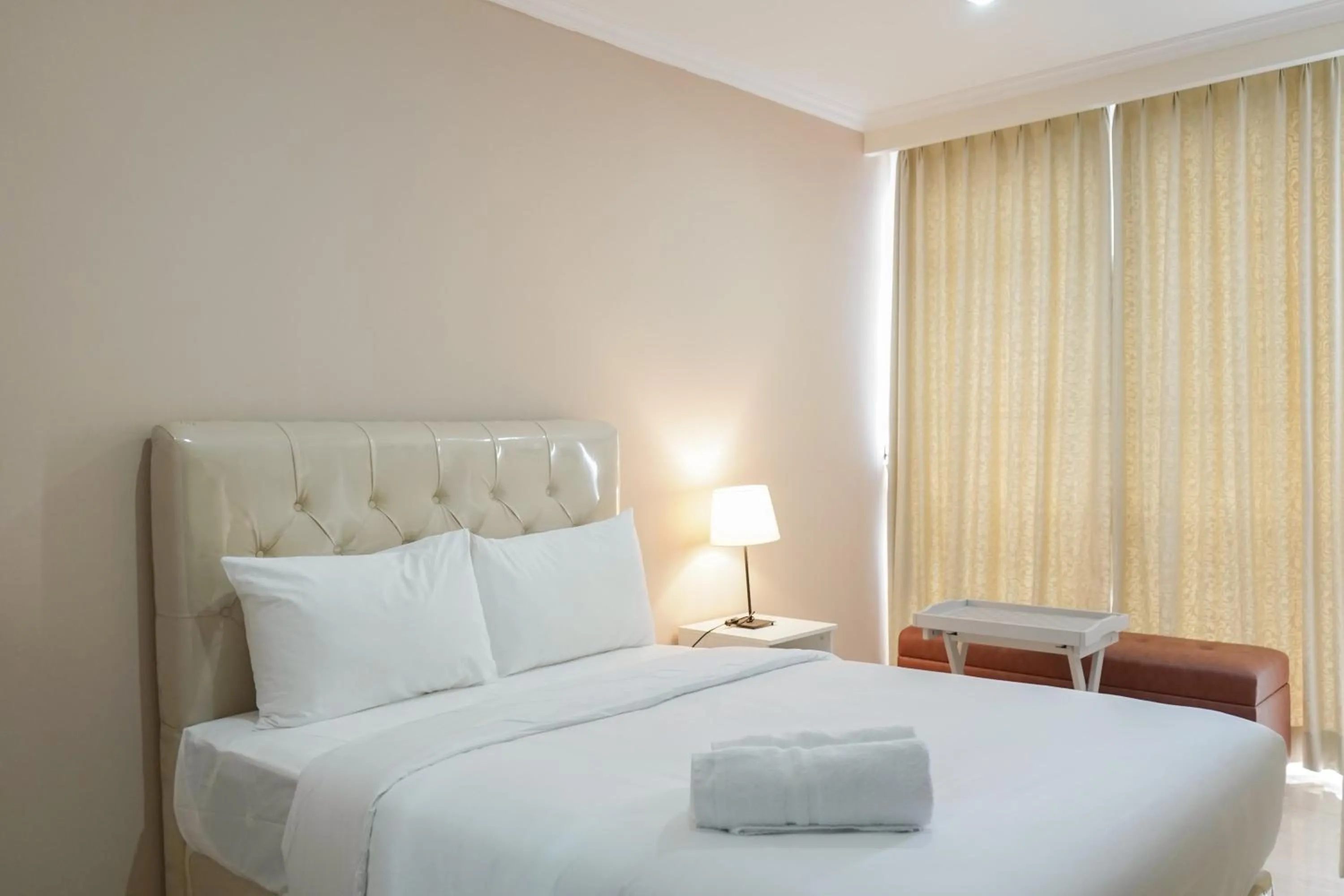 Bedroom in Stunning Studio Room at Menteng Park Apartment By Travelio